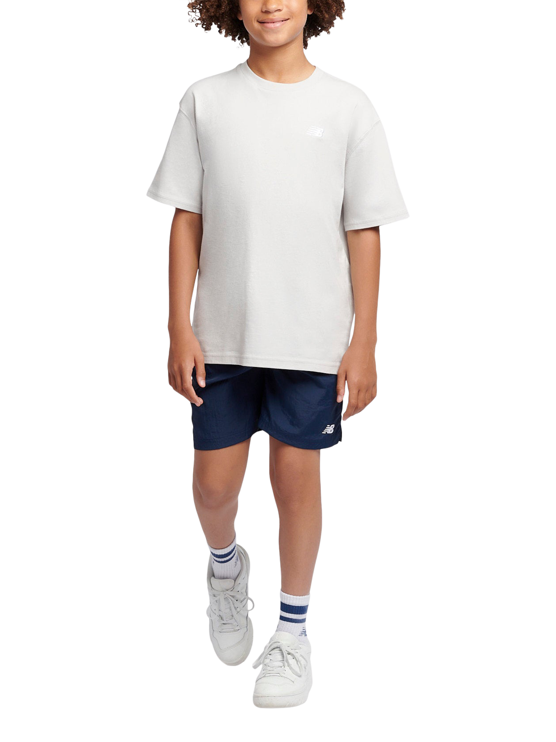Product image 5 of 8, which shows New Balance Kids' Logo Shorts, Navy, 7-8 years