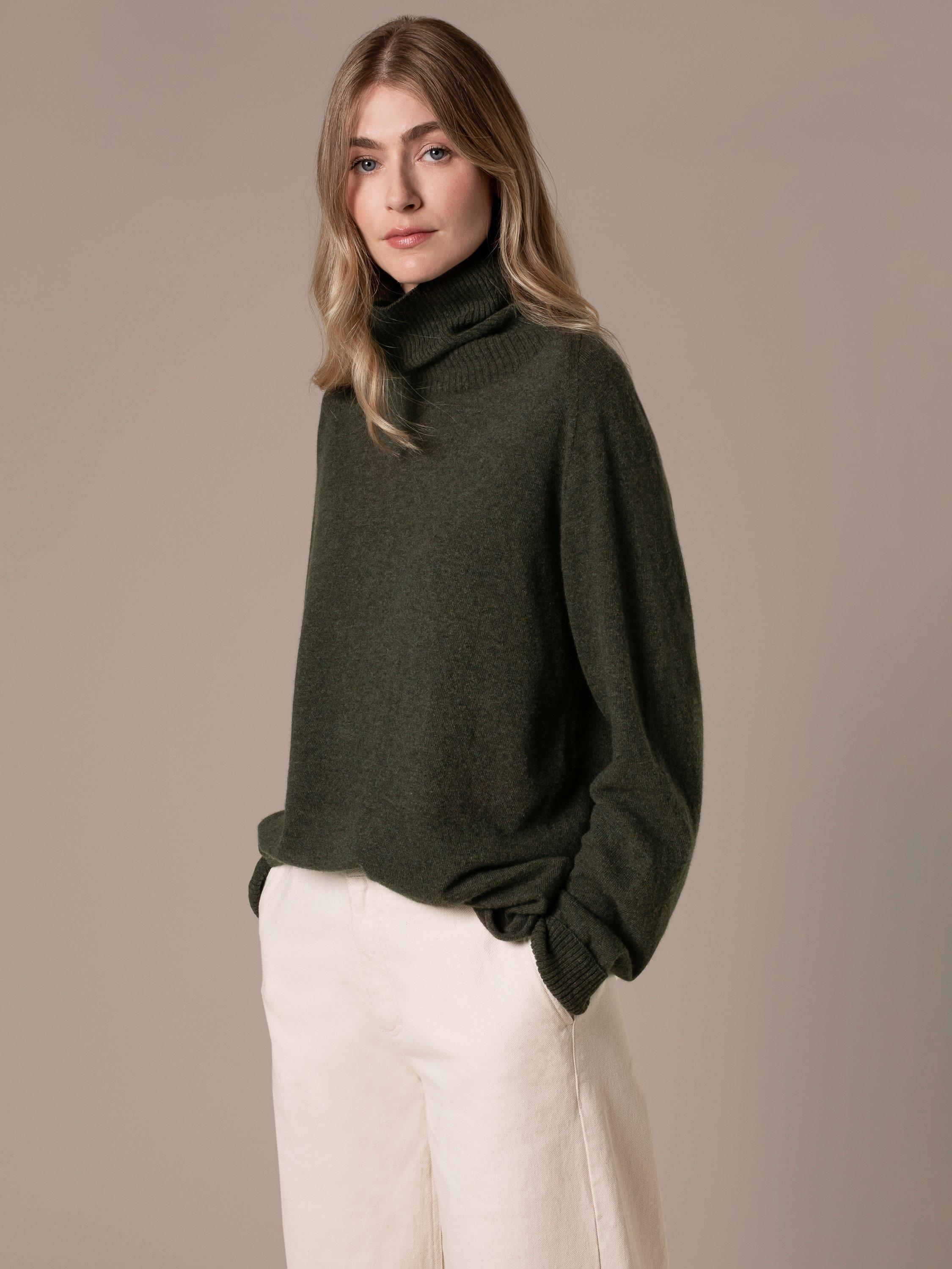 Product image 5 of 7, which shows Celtic & Co. Geelong Slouch Roll Neck Jumper, Olive, XS