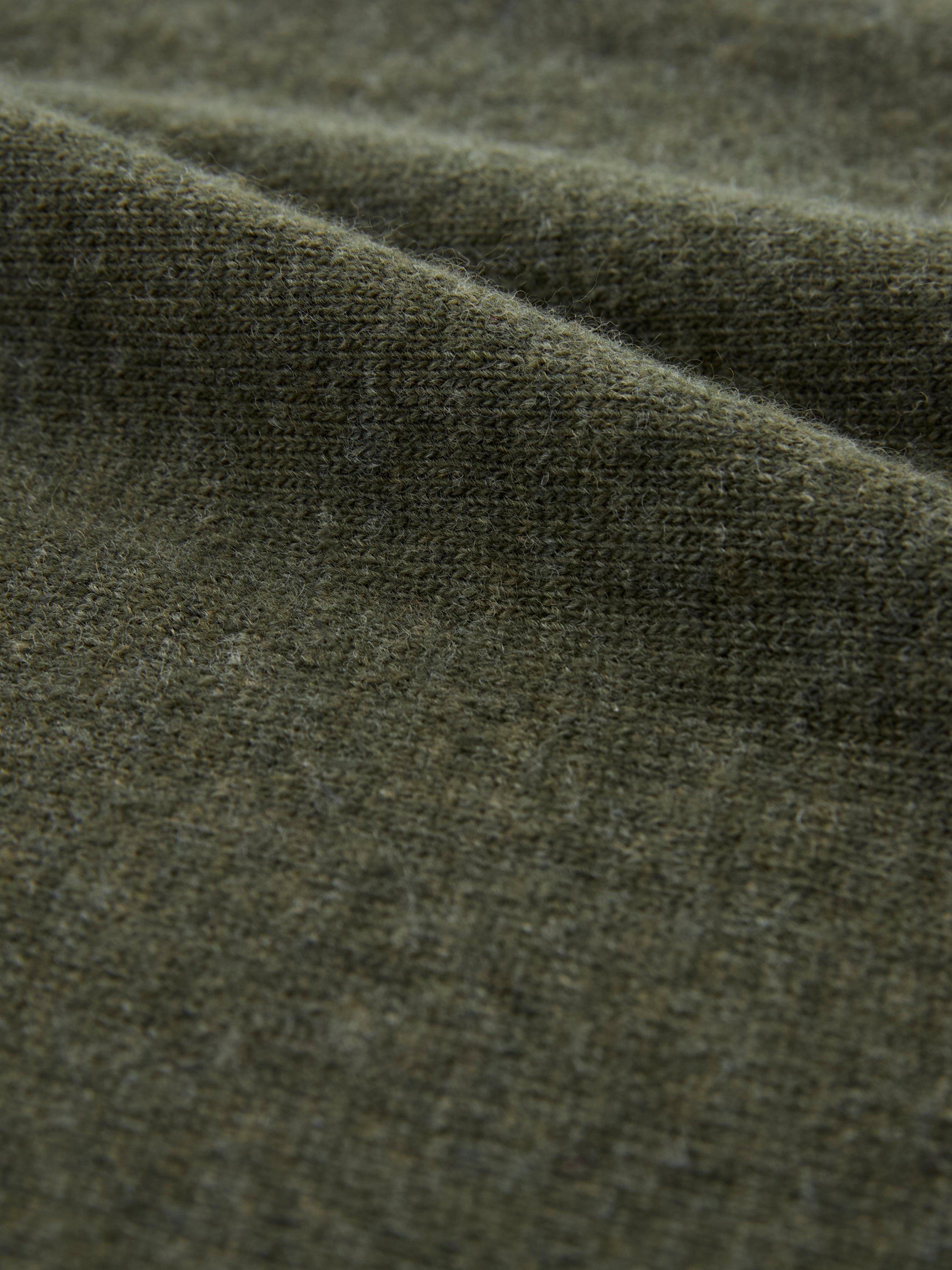 Product image 7 of 7, which shows Celtic & Co. Geelong Slouch Roll Neck Jumper, Olive, XS
