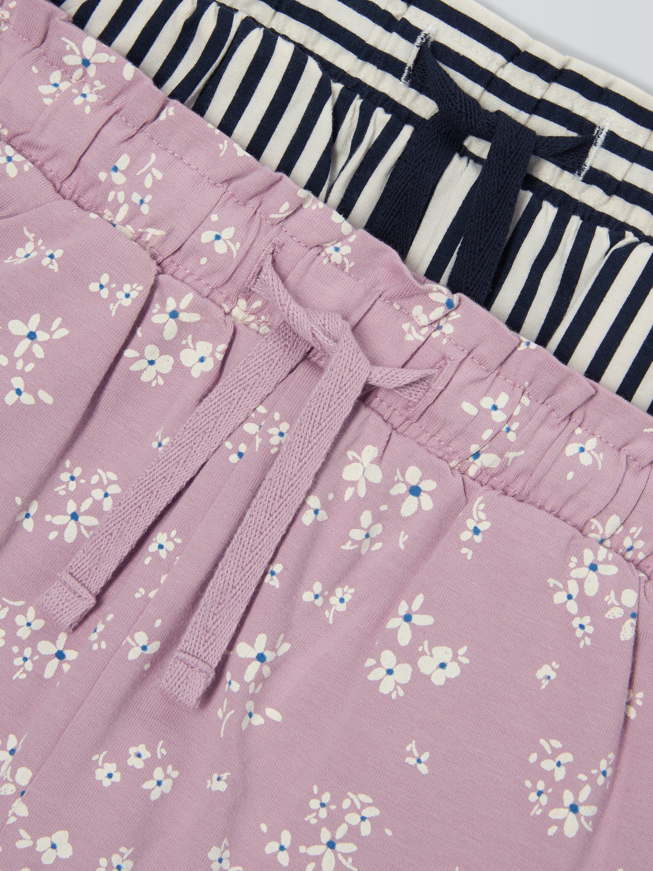 Product image 3 of 6, which shows John Lewis Kids' Stripe/Floral Frill Hem Jersey Shorts, Pack of 2, Pink Navy Mix, 2 years