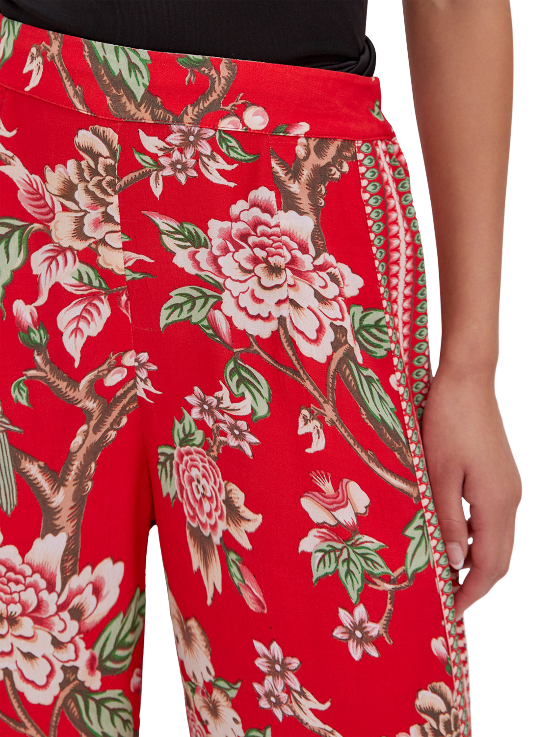 Product image 2 of 3, which shows Raishma Hallie Floral Trousers, Red, 10