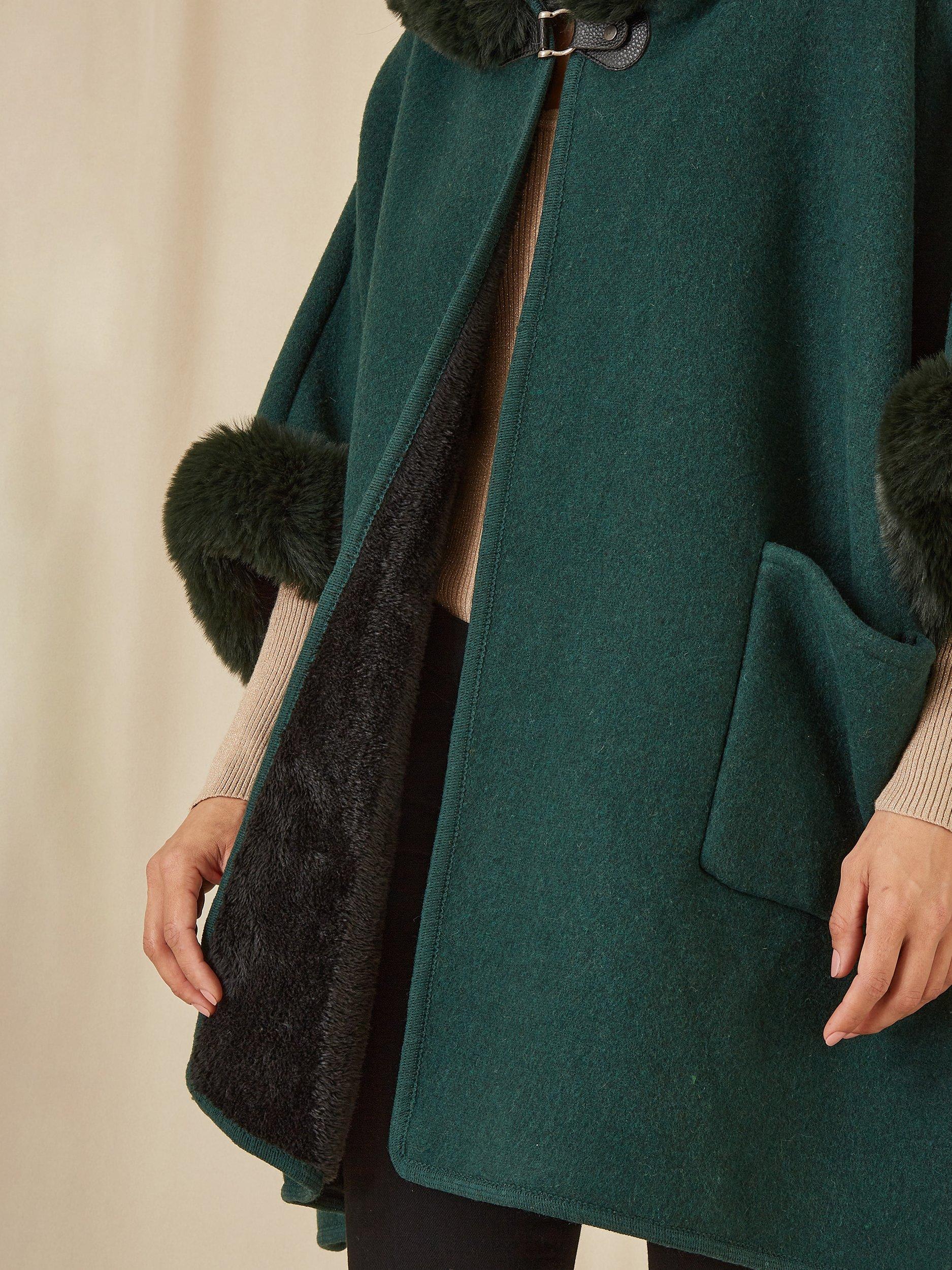 Product image 4 of 6, which shows Yumi Faux Fur Trim Cape, Green, S-M