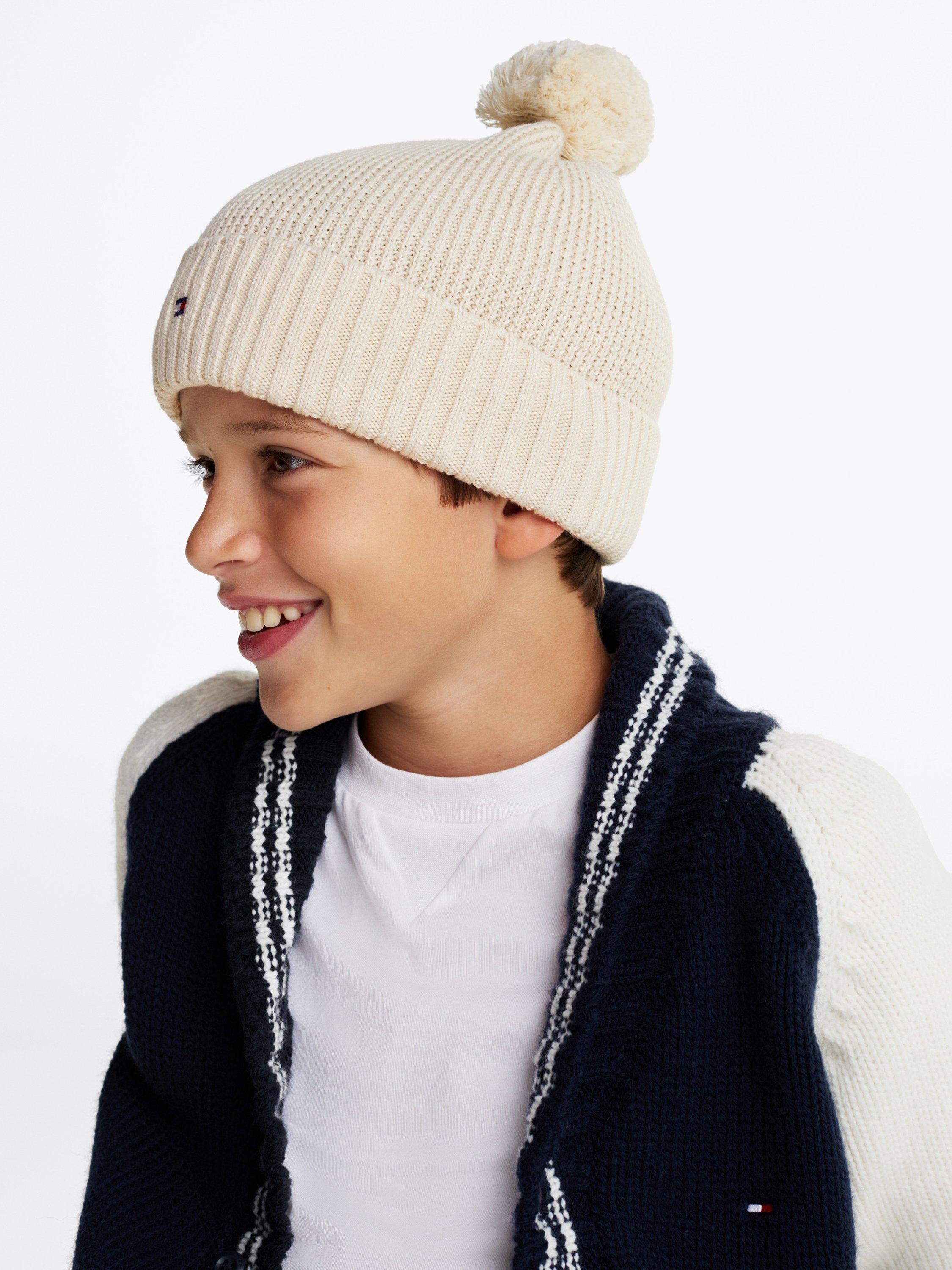 Product image 6 of 6, which shows Tommy Hilfiger Kids' Organic Cotton Pom Pom Beanie, Newsprint, S-M