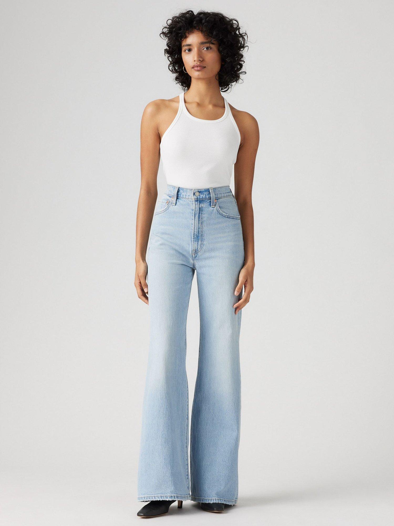 Product image 1 of 4, which shows Levi's Ribcage Wide Leg Jeans, Sits Well Together, 24