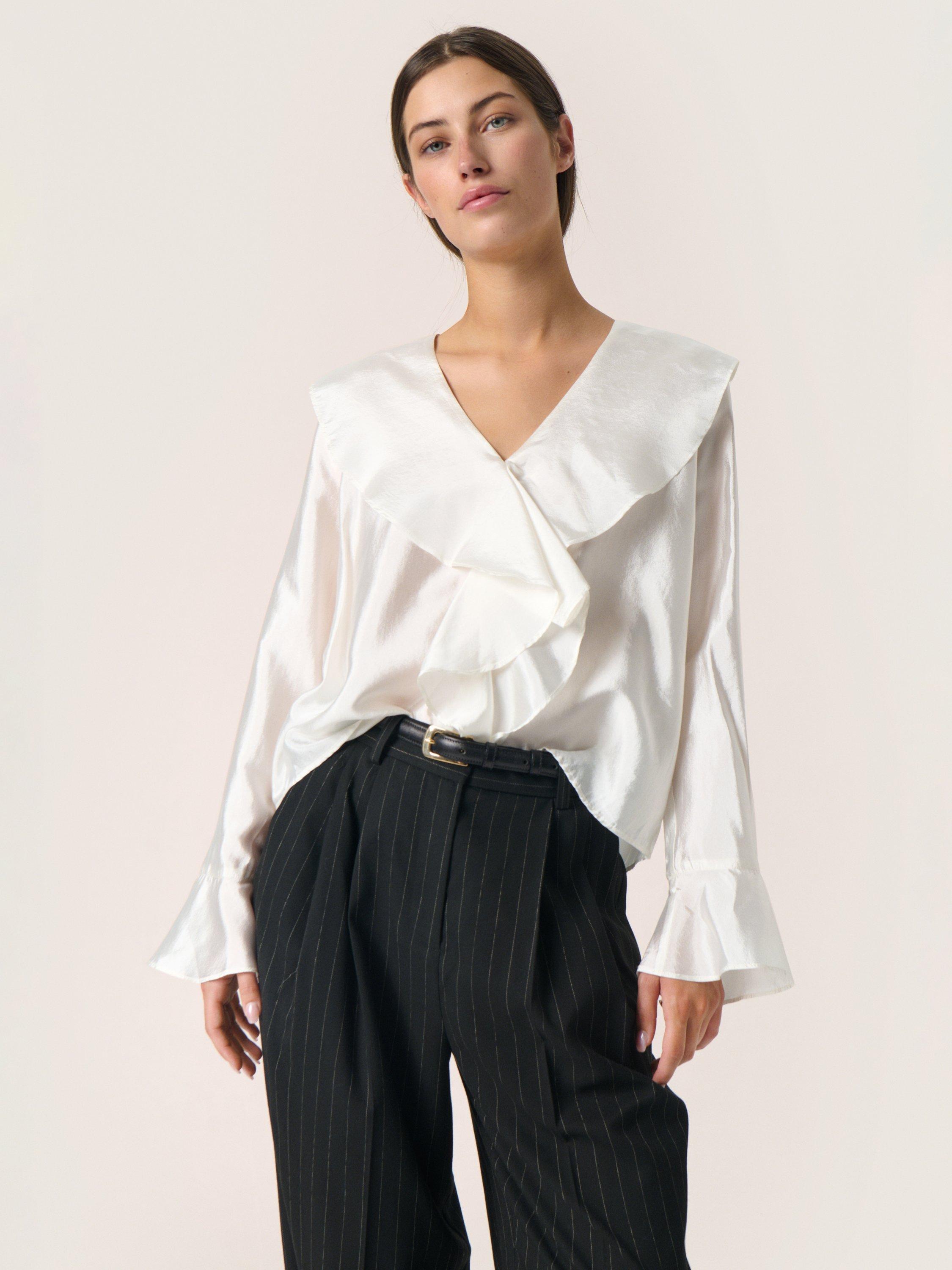 Product image 1 of 6, which shows Soaked In Luxury Karolina Ruffle Top, White, XS