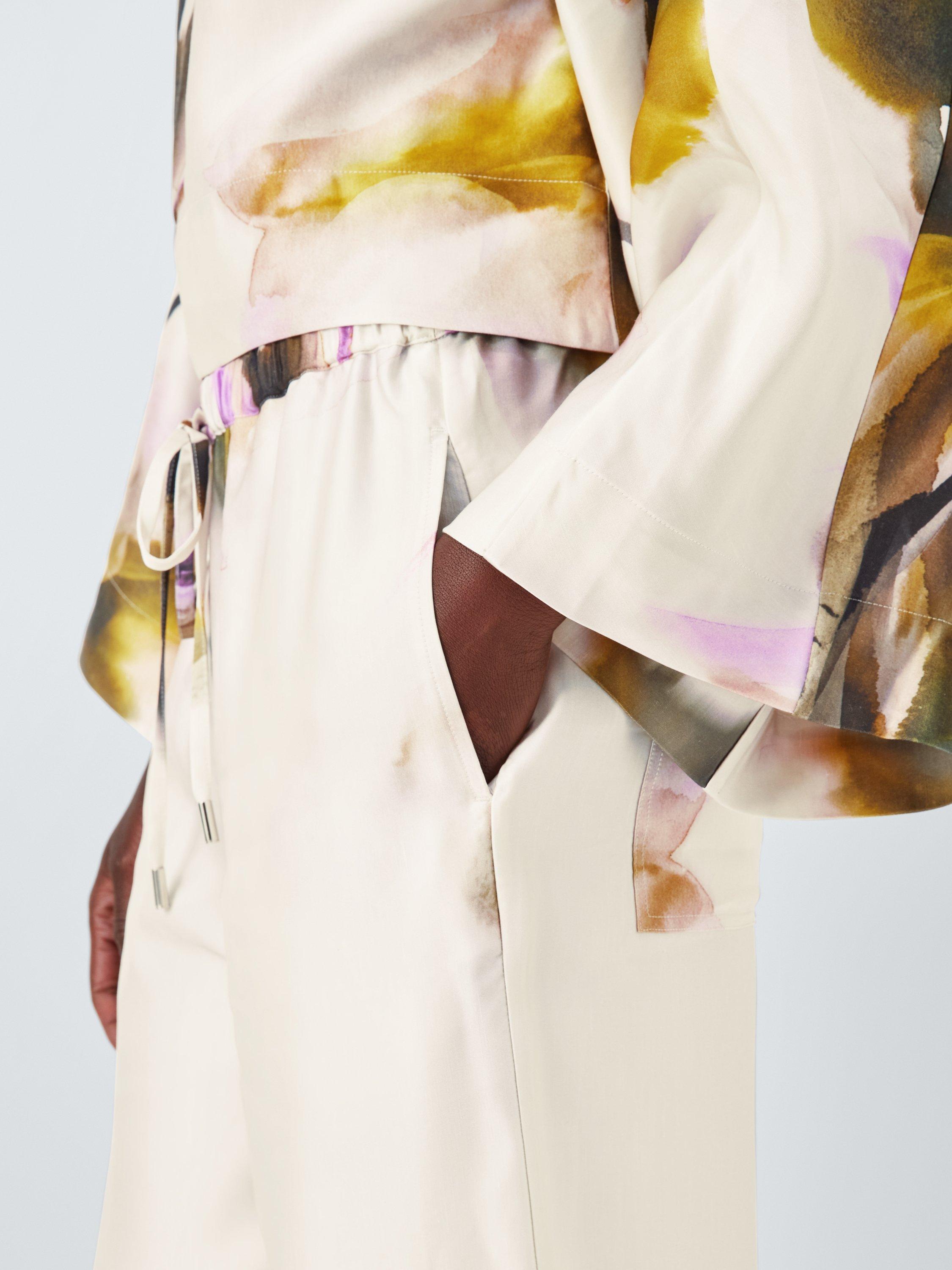 Product image 5 of 7, which shows John Lewis Editions Floral Print Fluid Trousers, Violetta Bloom, 6