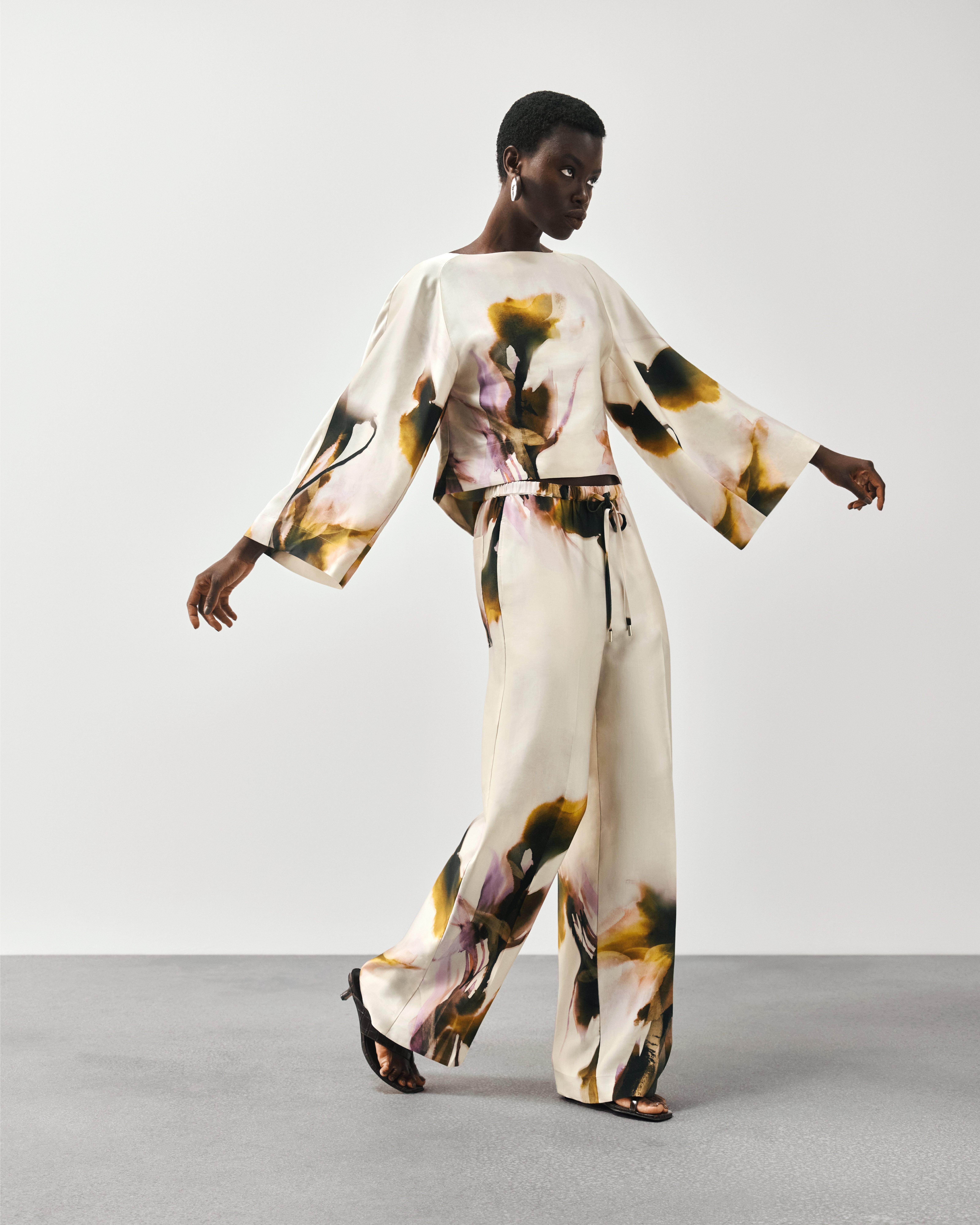 Product image 7 of 7, which shows John Lewis Editions Floral Print Fluid Trousers, Violetta Bloom, 6