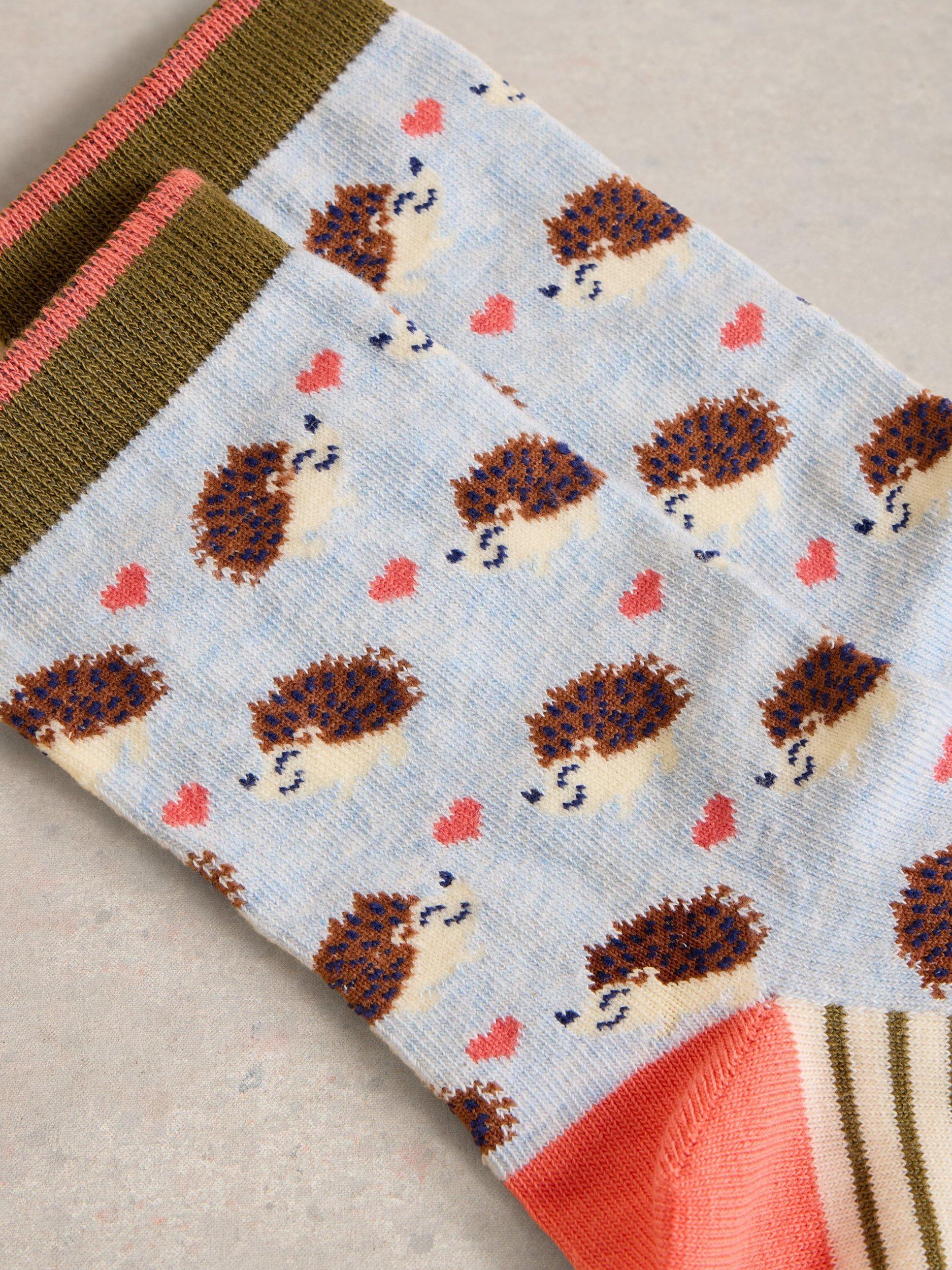 Product image 2 of 2, which shows White Stuff Hedgehog Organic Cotton Rich Ankle Socks, Light Blue/Multi, 6-8