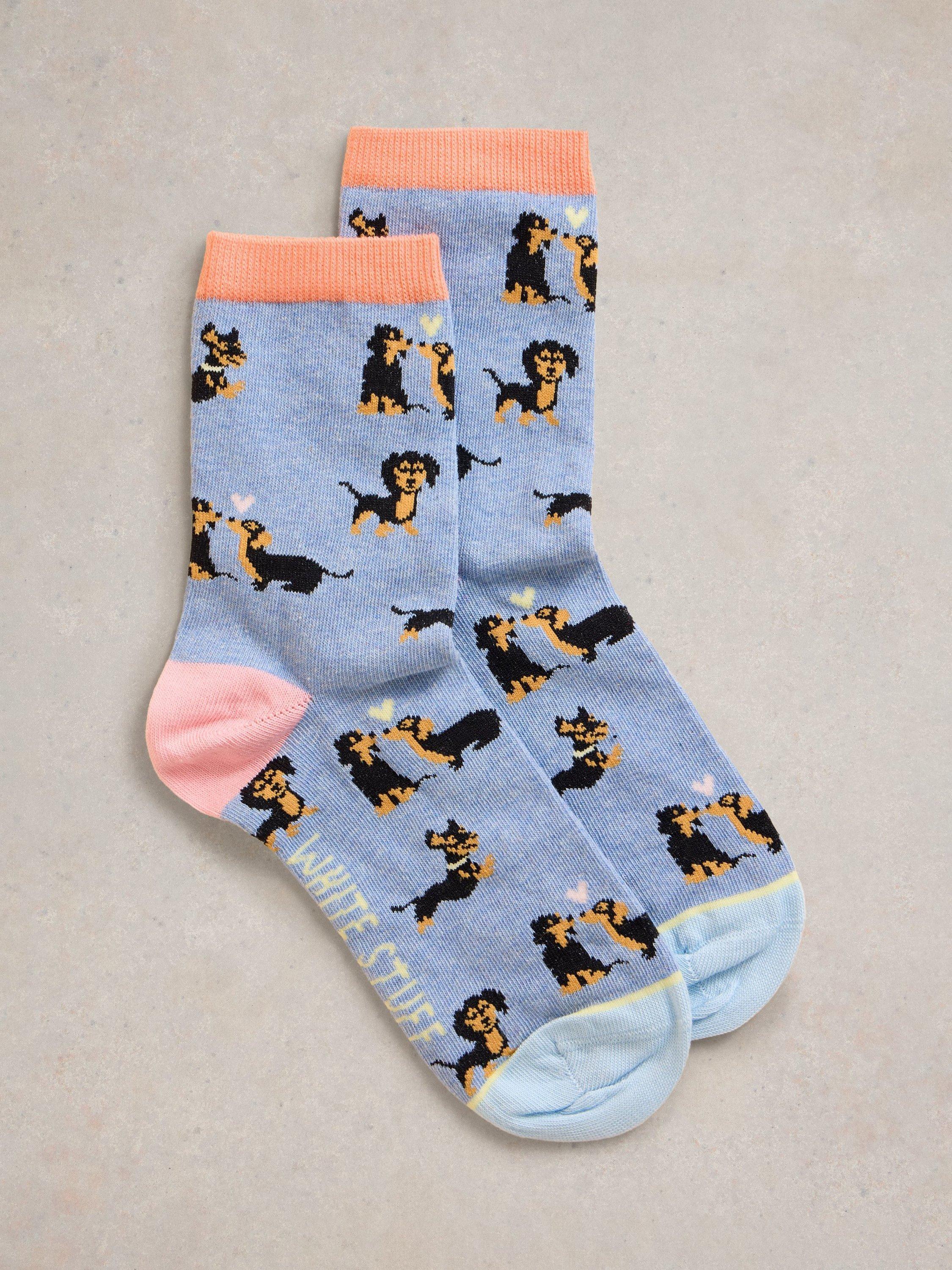 Product image 1 of 2, which shows White Stuff Kissing Dogs Organic Cotton Rich Socks, Light Blue/Multi, 3-5.5