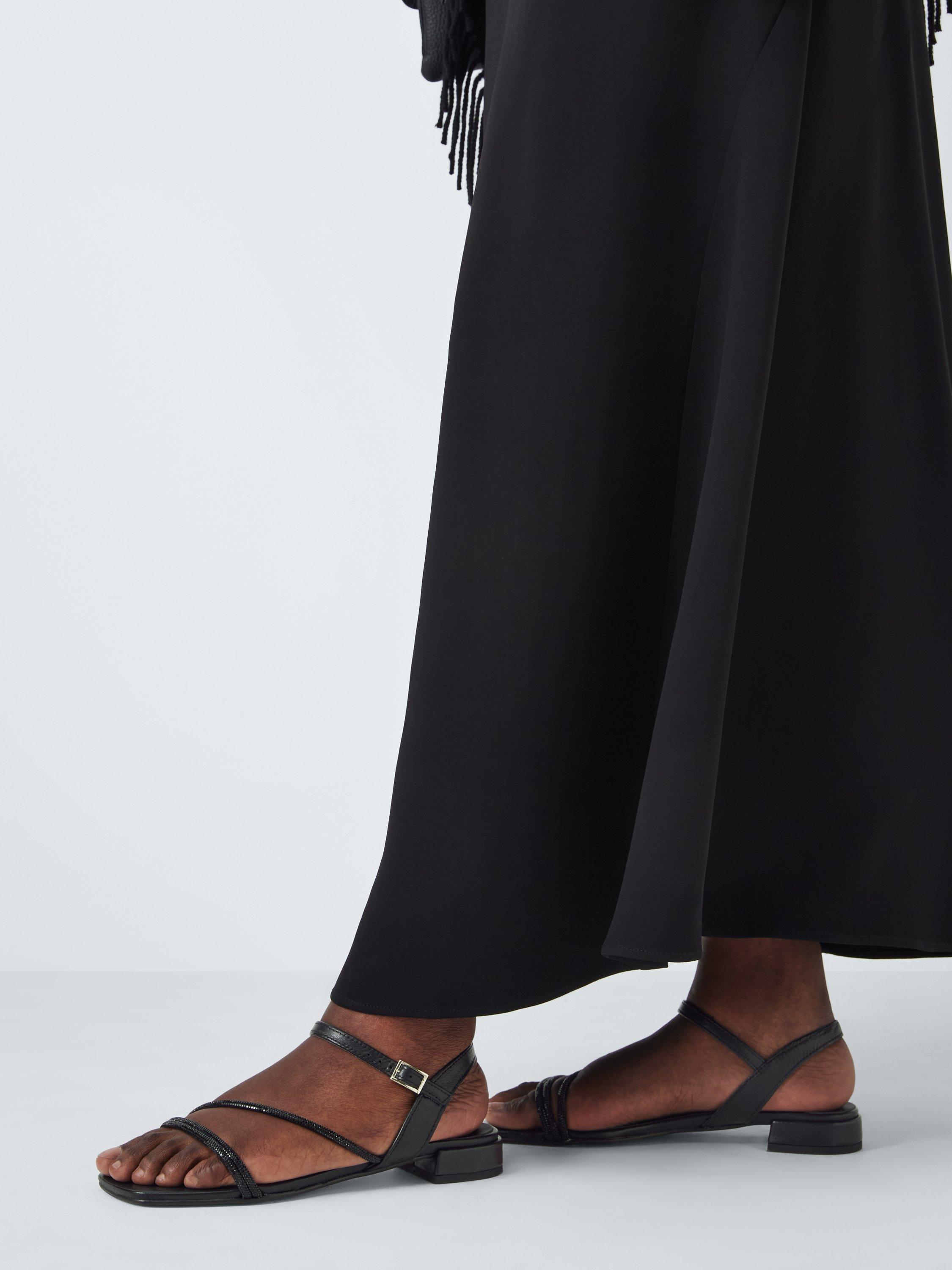 Product image 2 of 6, which shows John Lewis Lisbeth Leather Asymmetric Hot Fix Gem Stone Dressy Sandals, Black, 3