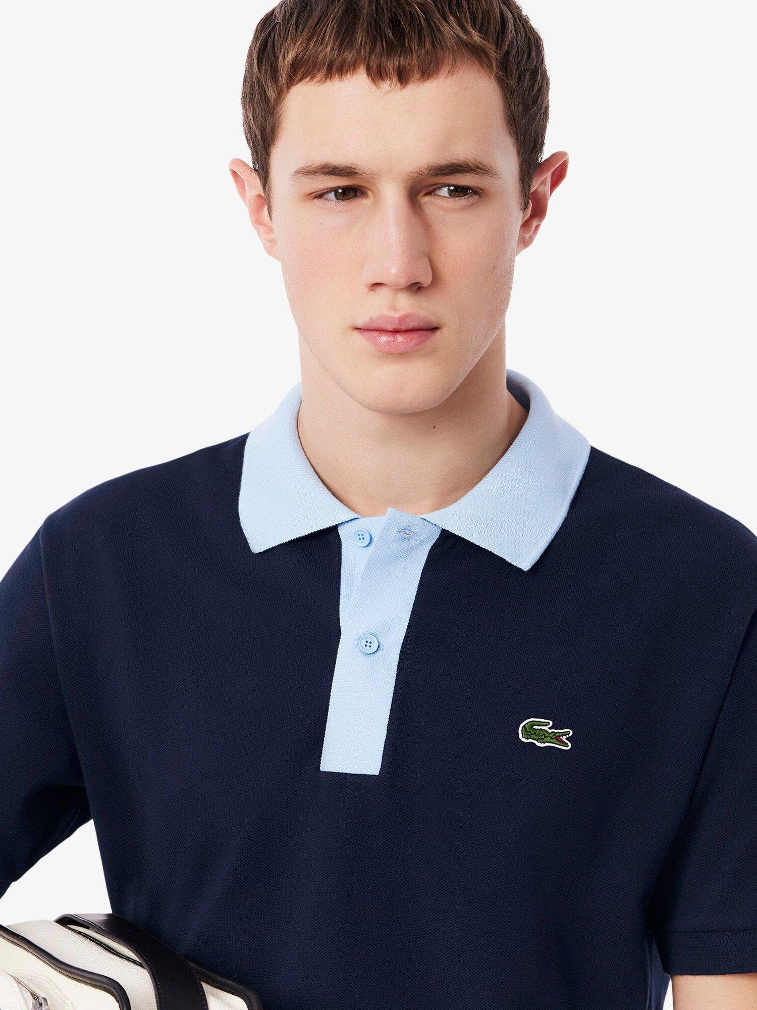Product image 4 of 7, which shows Lacoste Cotton Regular Fit Core Essential Polo Shirt, Navy Blue/Overview, S