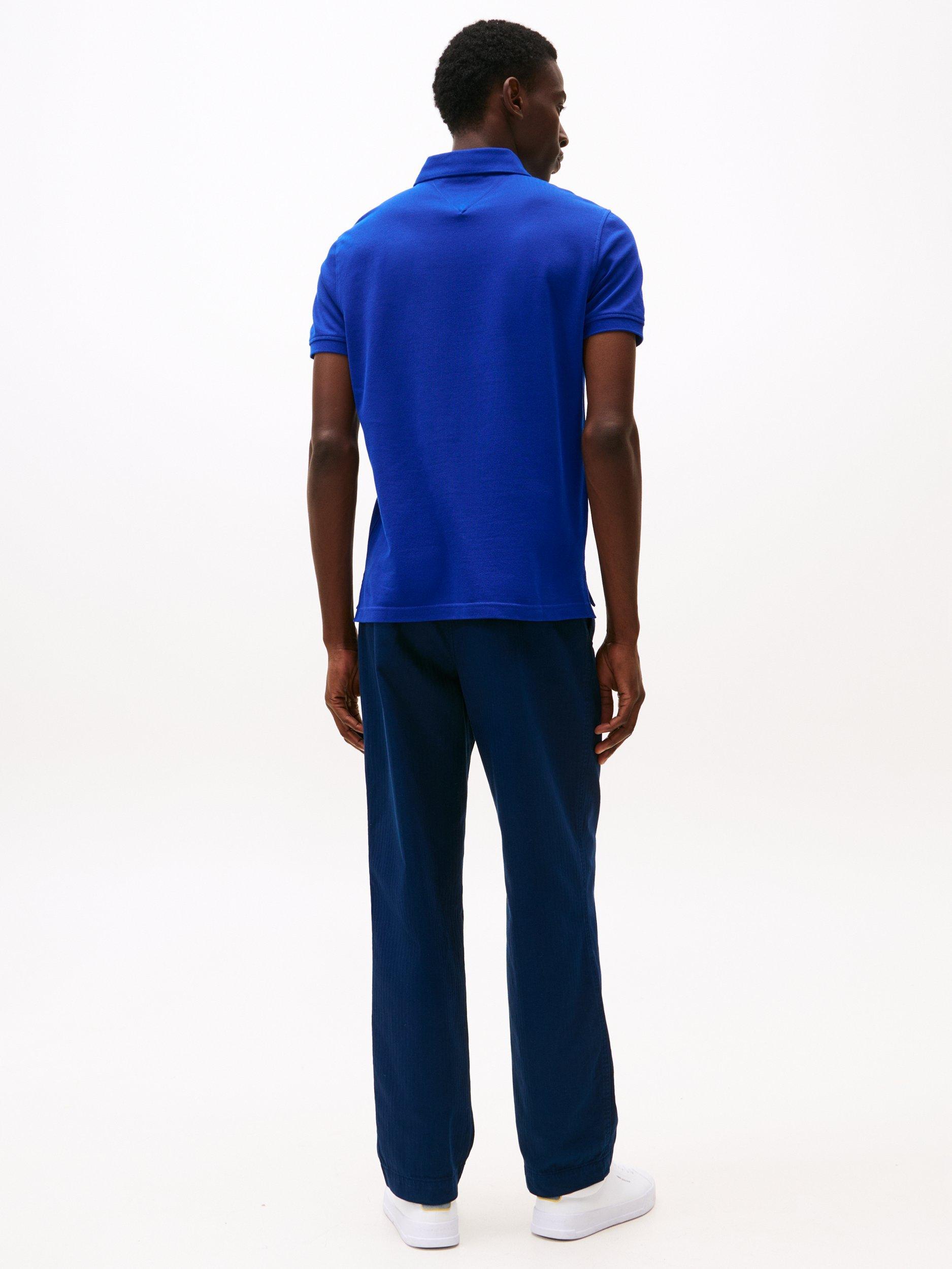 Product image 3 of 8, which shows Tommy Hilfiger 1985 Regular Fit Polo Shirt, Wedge Blue, XS