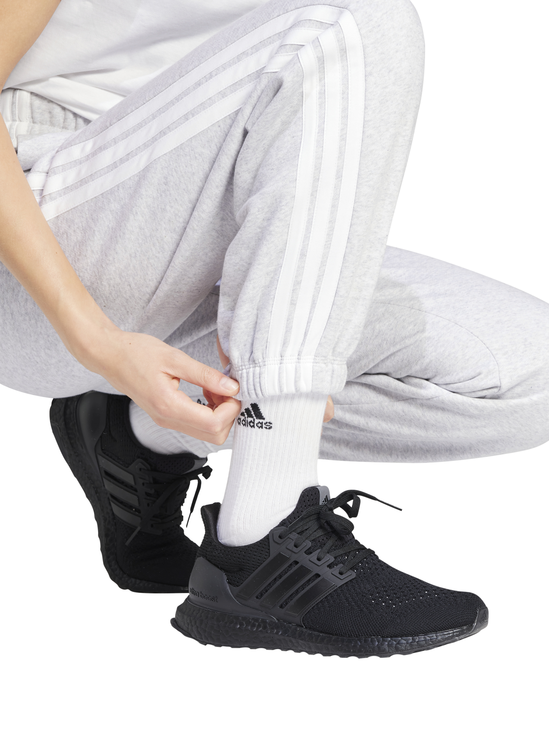Product image 4 of 6, which shows adidas Women's Essentials 3 Stripes Fleece Loose Trousers, Grey Heather/White, XS