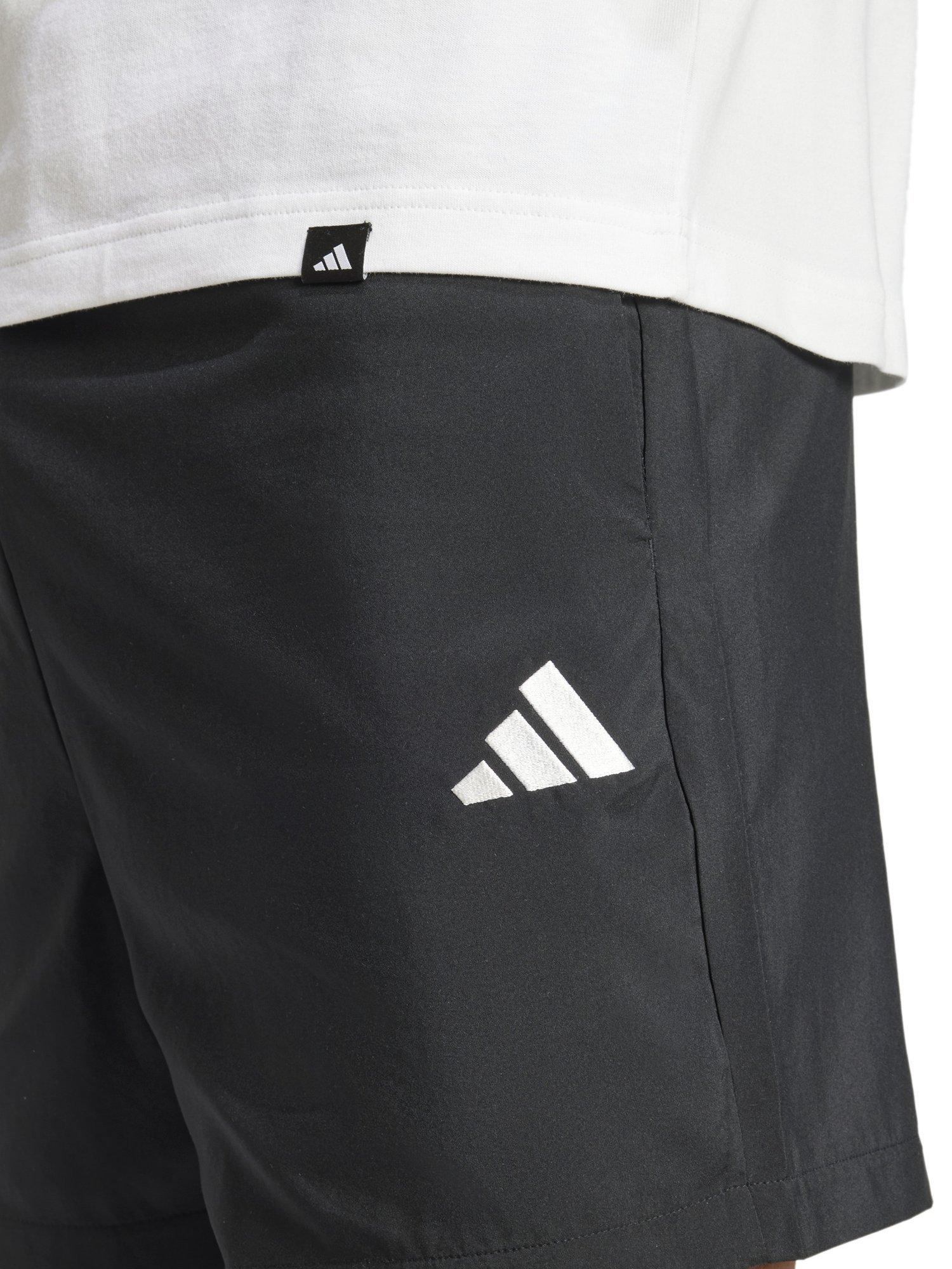 Product image 4 of 6, which shows adidas Essentials Small Logo Chelsea Shorts, Black/White, S
