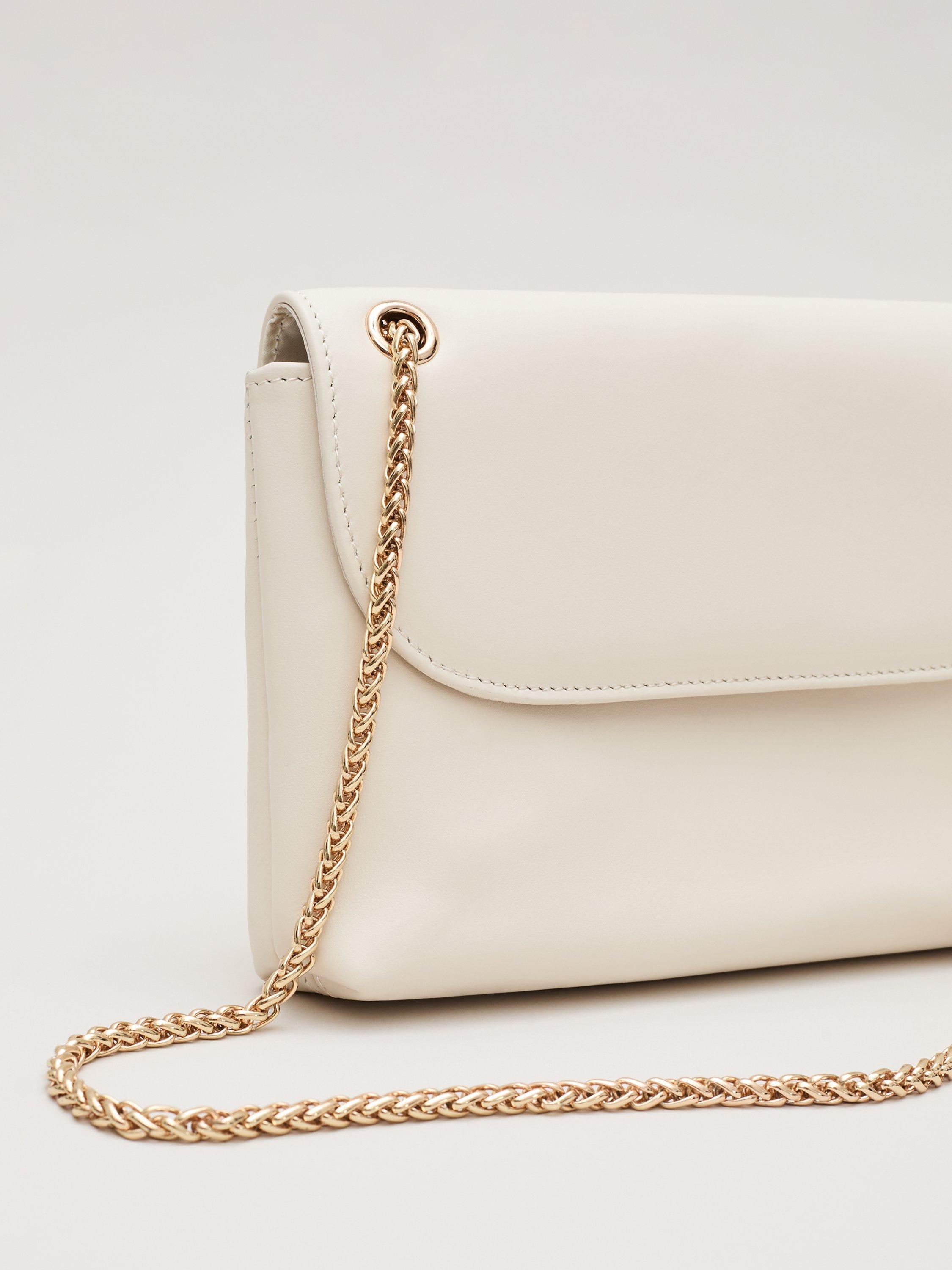 Product image 3 of 9, which shows Phase Eight Leather Clutch Bag, Ivory, One Size