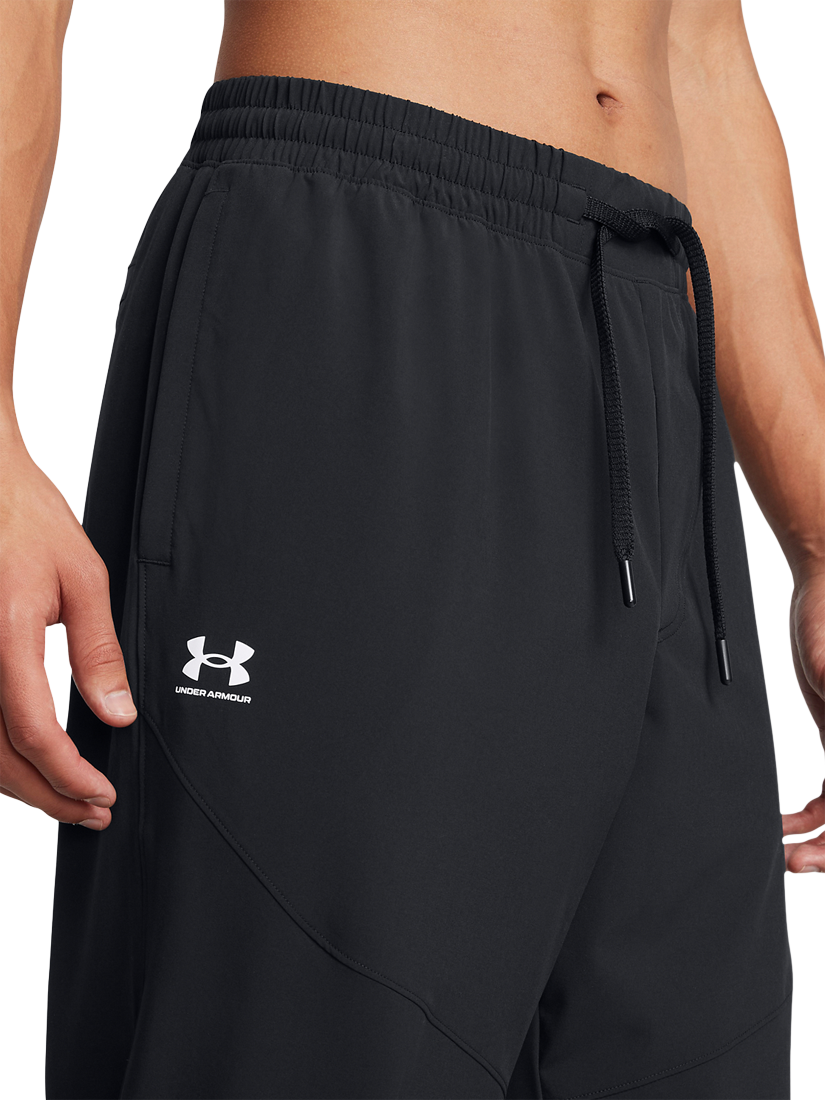 Product image 4 of 6, which shows Under Armour Men's Vibe Woven Joggers, Black / White, S
