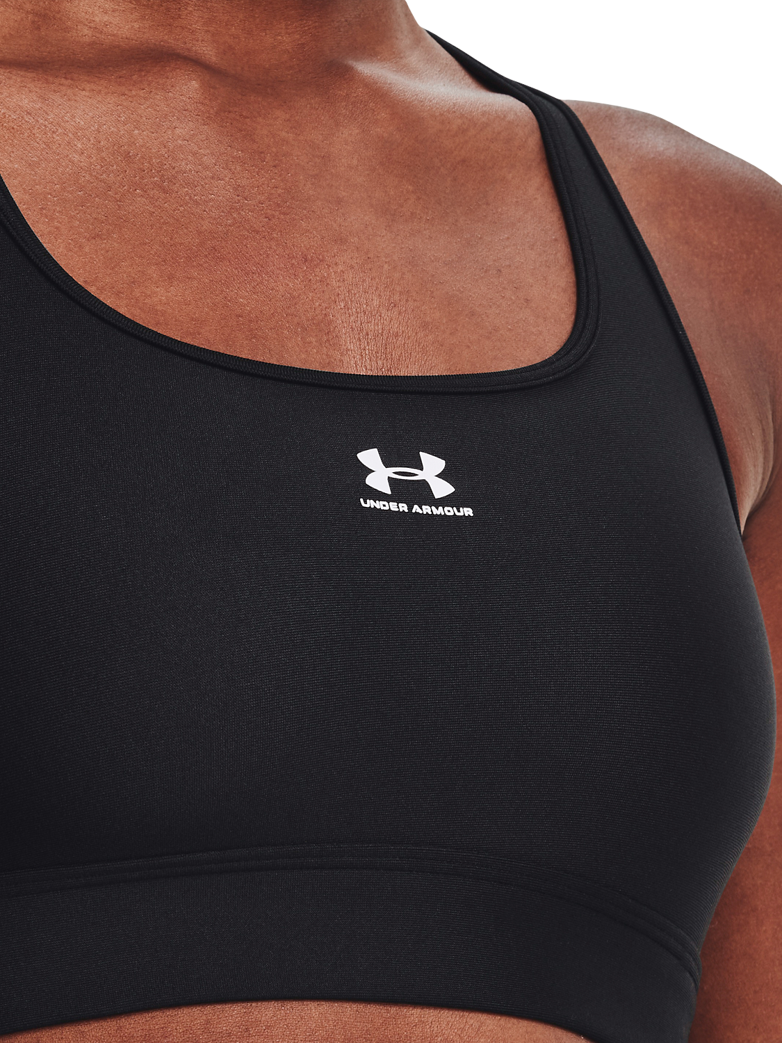Product image 4 of 6, which shows Under Armour HeatGear® Mid Padless Sports Bra, Black / White, XS