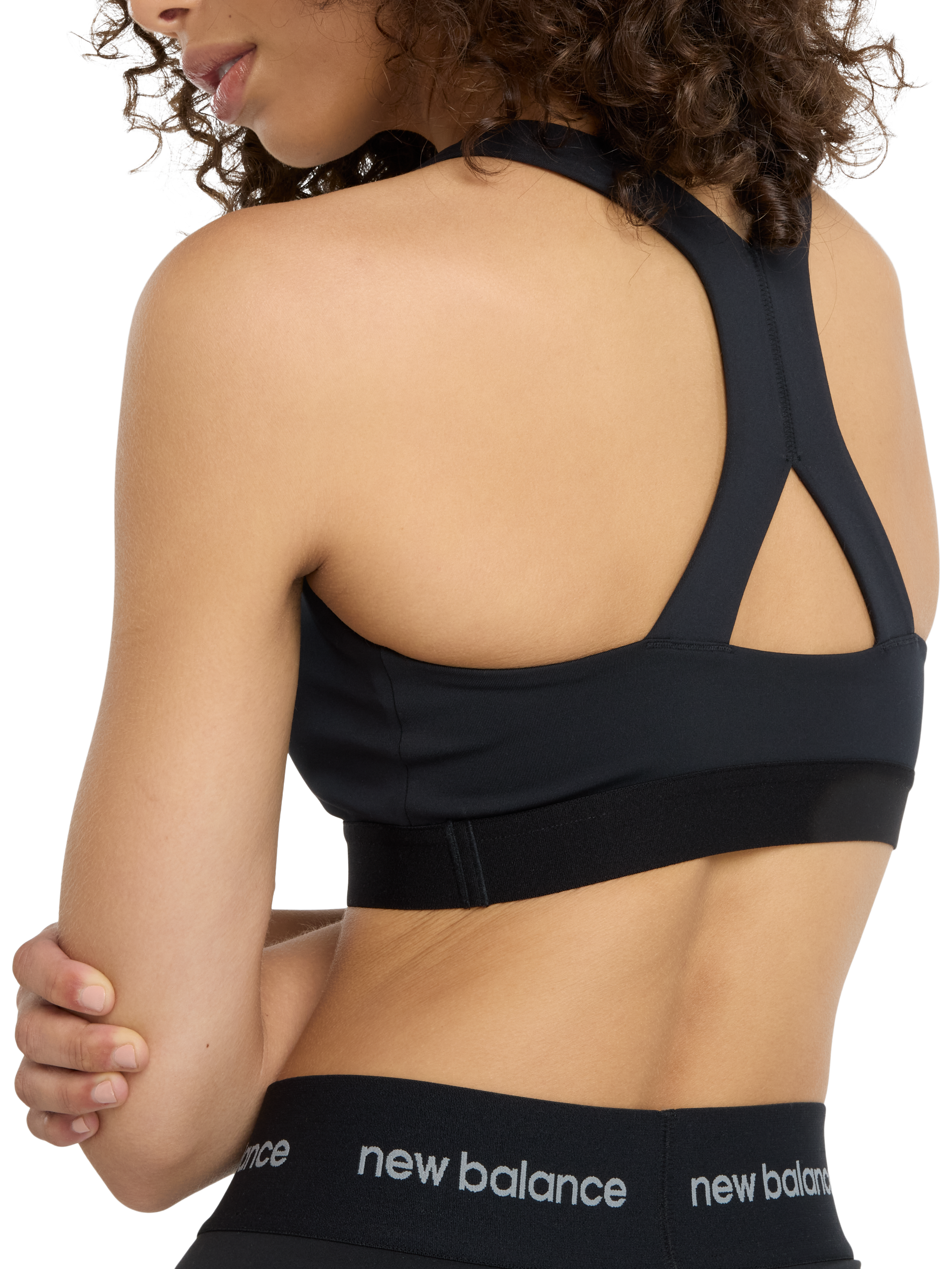 Product image 4 of 7, which shows New Balance Essential Sports Bra, Black, XS