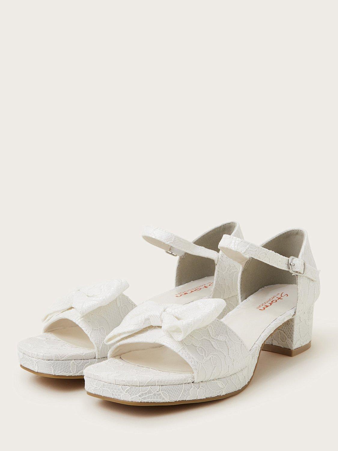 Product image 2 of 3, which shows Monsoon Kids' Bridal Bow Lace Heeled Shoes, Ivory, 1