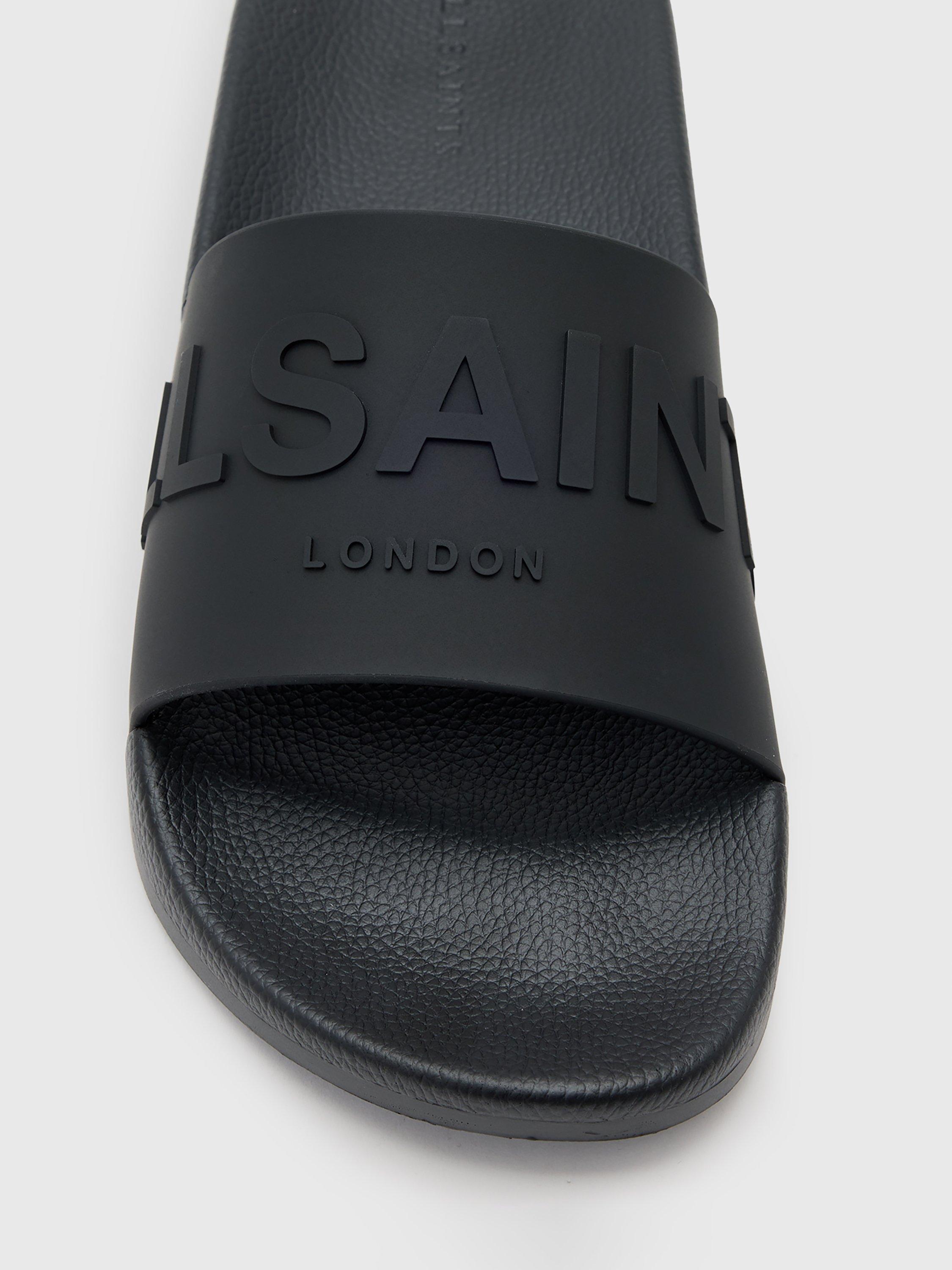 Product image 2 of 5, which shows AllSaints Biggy Slip On Logo Sliders, Black, EU44