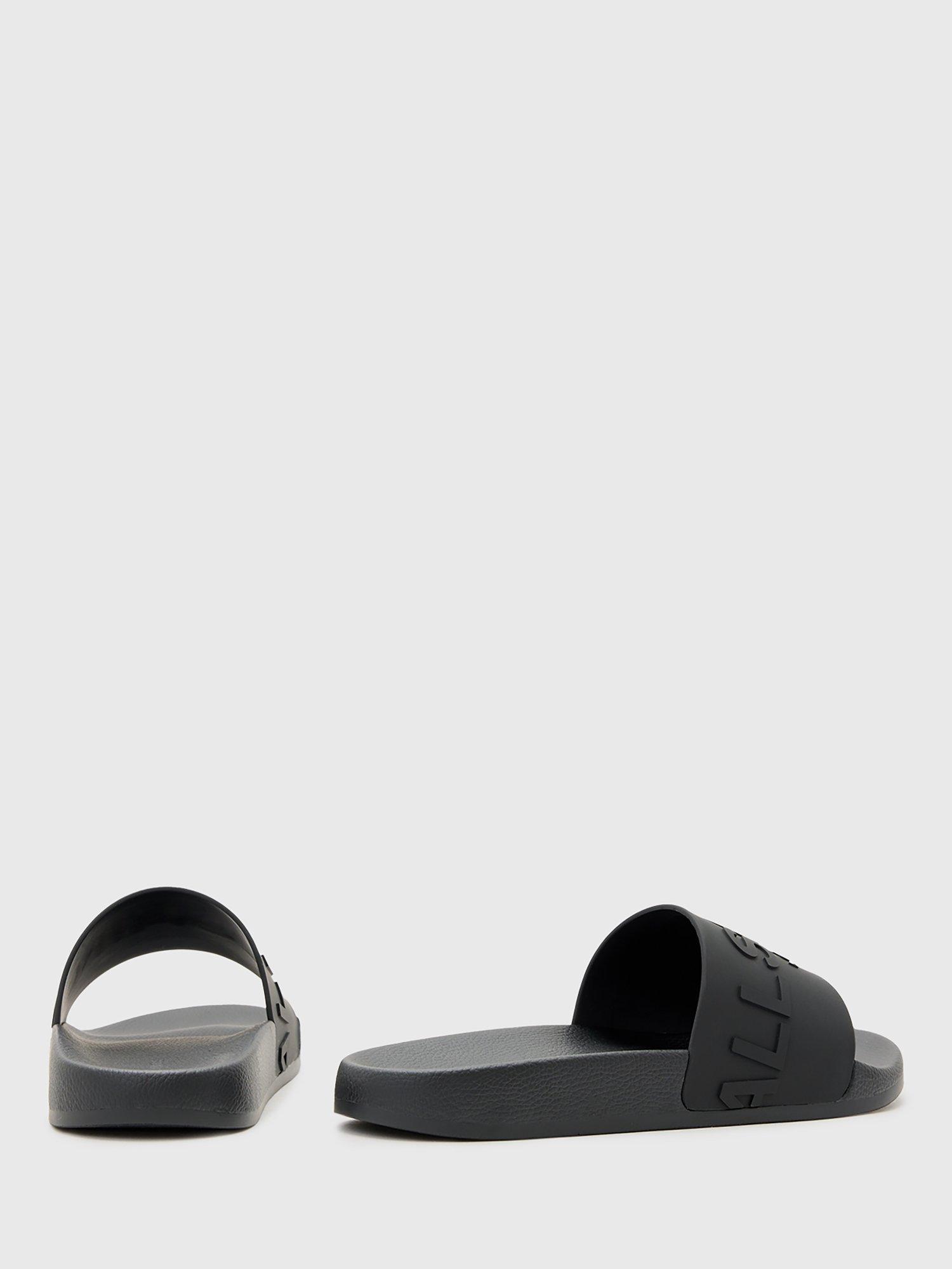 Product image 5 of 5, which shows AllSaints Biggy Slip On Logo Sliders, Black, EU44