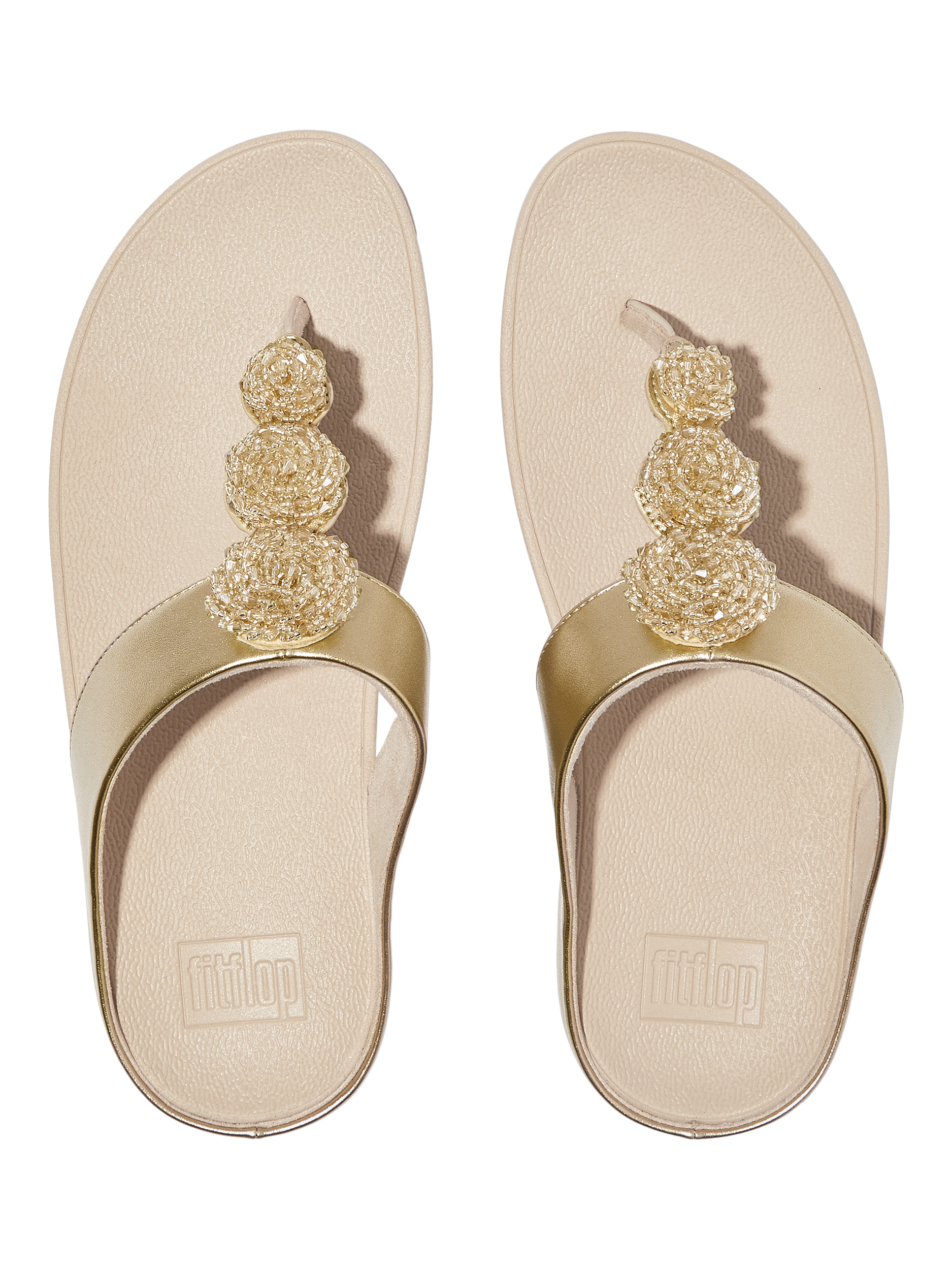 Product image 4 of 4, which shows FitFlop Fino Beaded Button Sandals, Gold, 3
