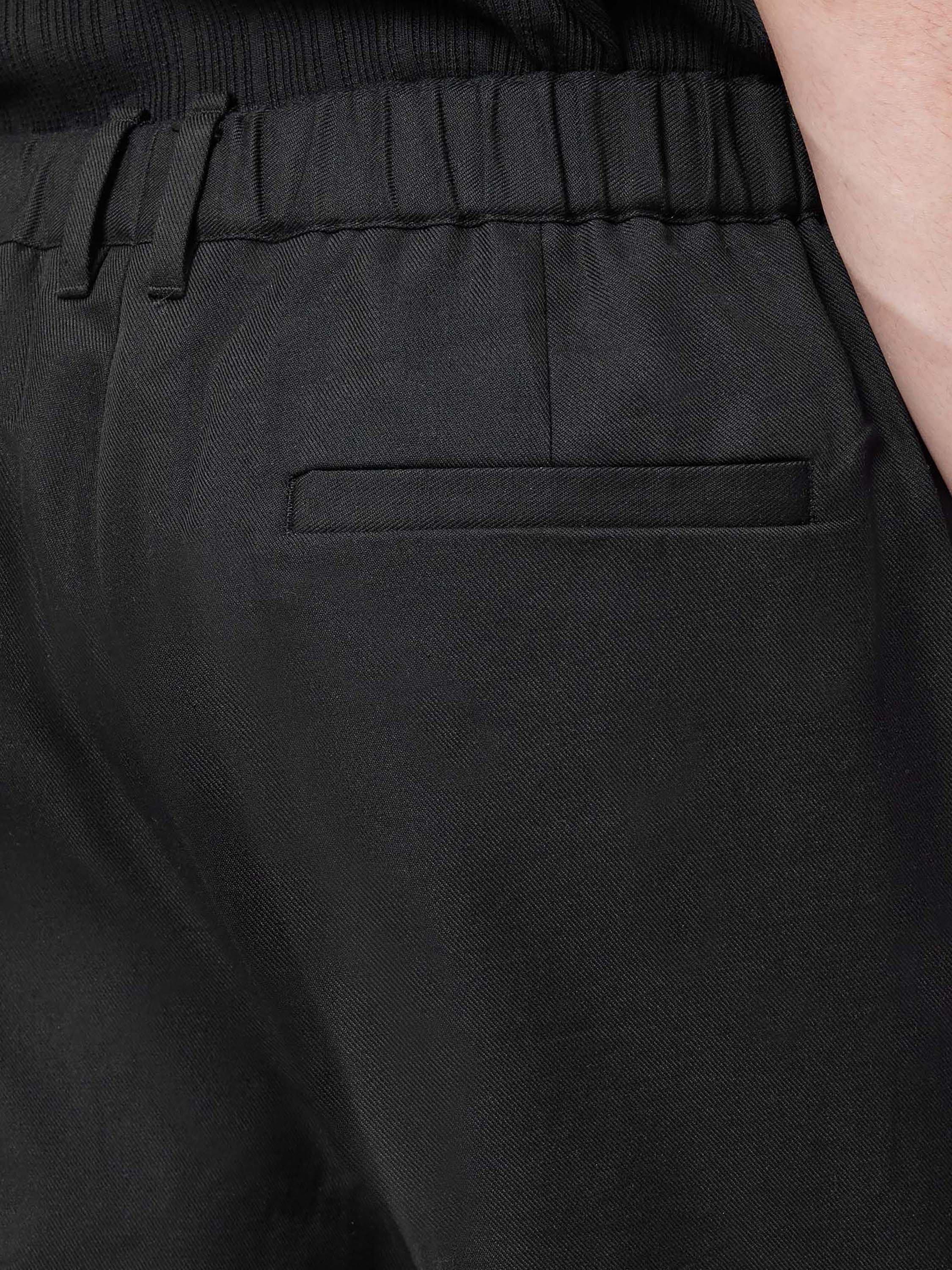 Product image 6 of 7, which shows AllSaints Cotton Blend Regular Fit Trousers, Black, 28R