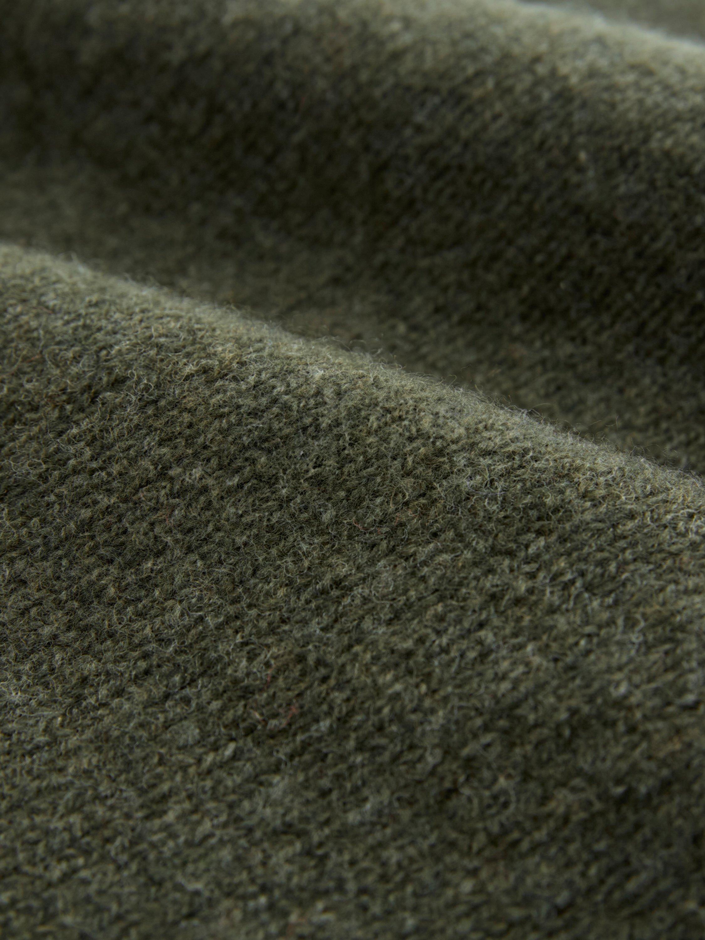 Product image 3 of 3, which shows Celtic & Co. Super Soft Geelong Wool Beanie Hat, Dark Navy, Olive, One Size