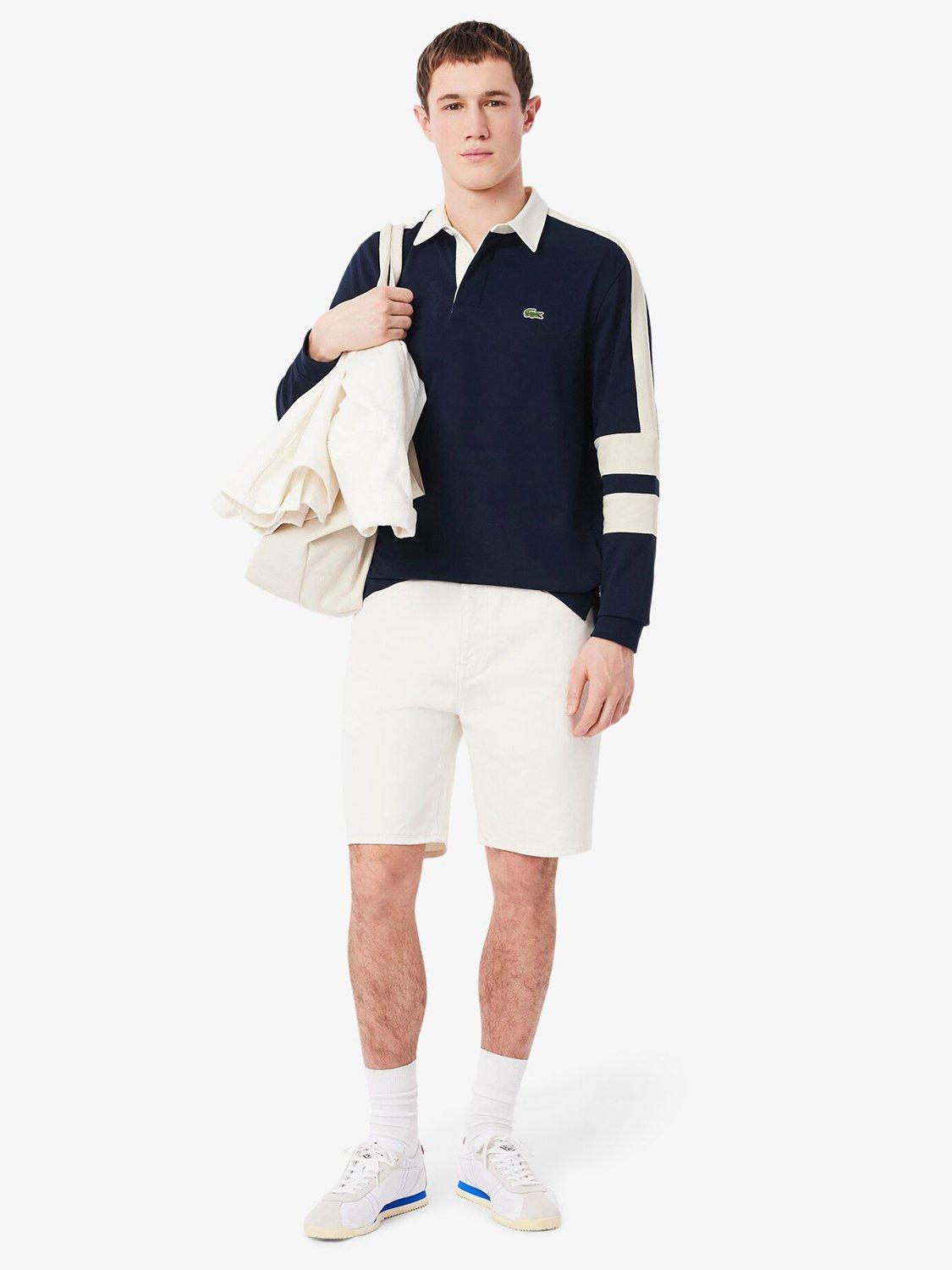 Product image 1 of 7, which shows Lacoste Cotton Regular Fit Long Sleeve Tennis Legacy Polo Shirt, Navy Blue, M