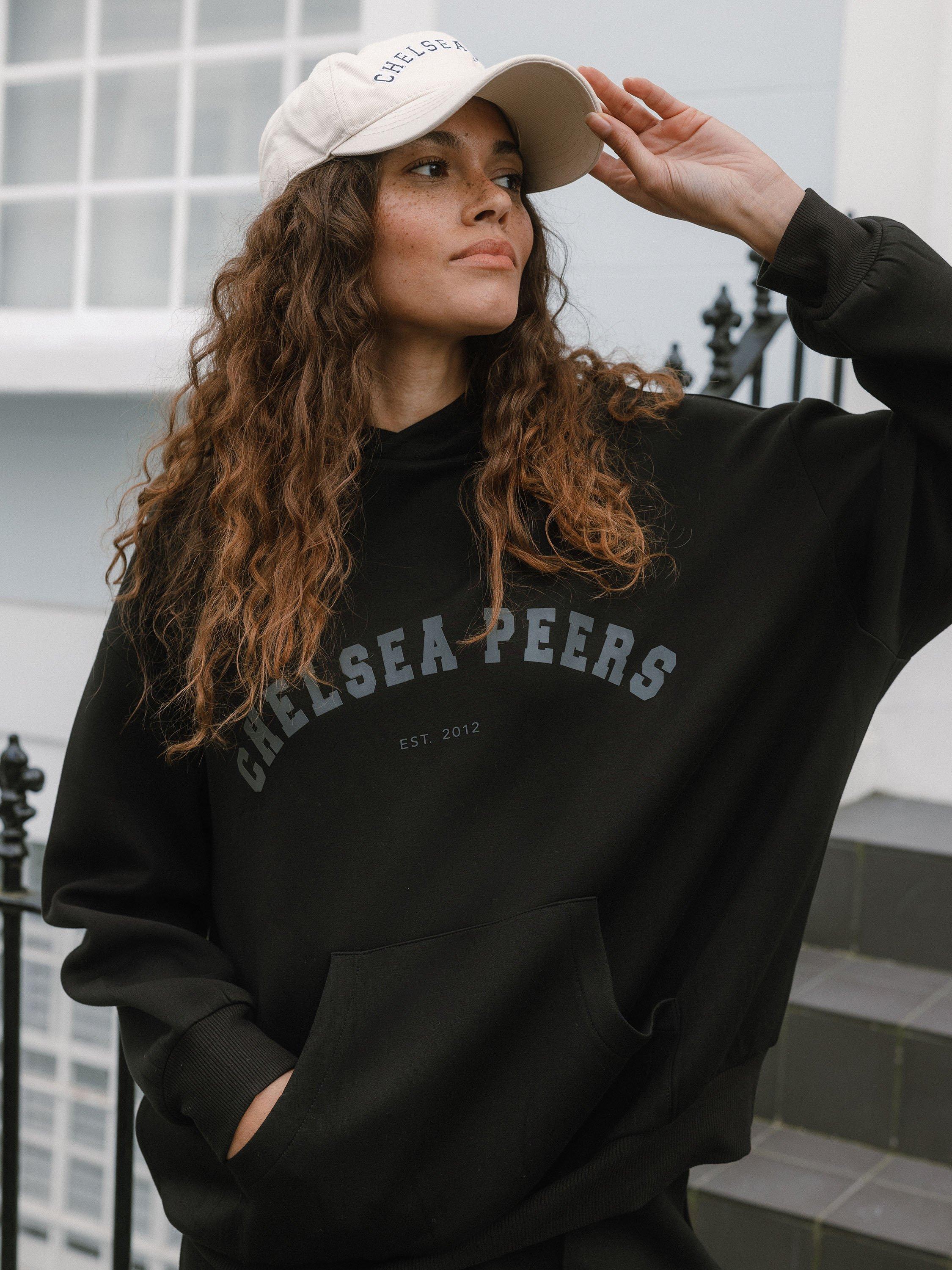 Product image 2 of 6, which shows Chelsea Peers Scuba Logo Hoodie, Black, 18