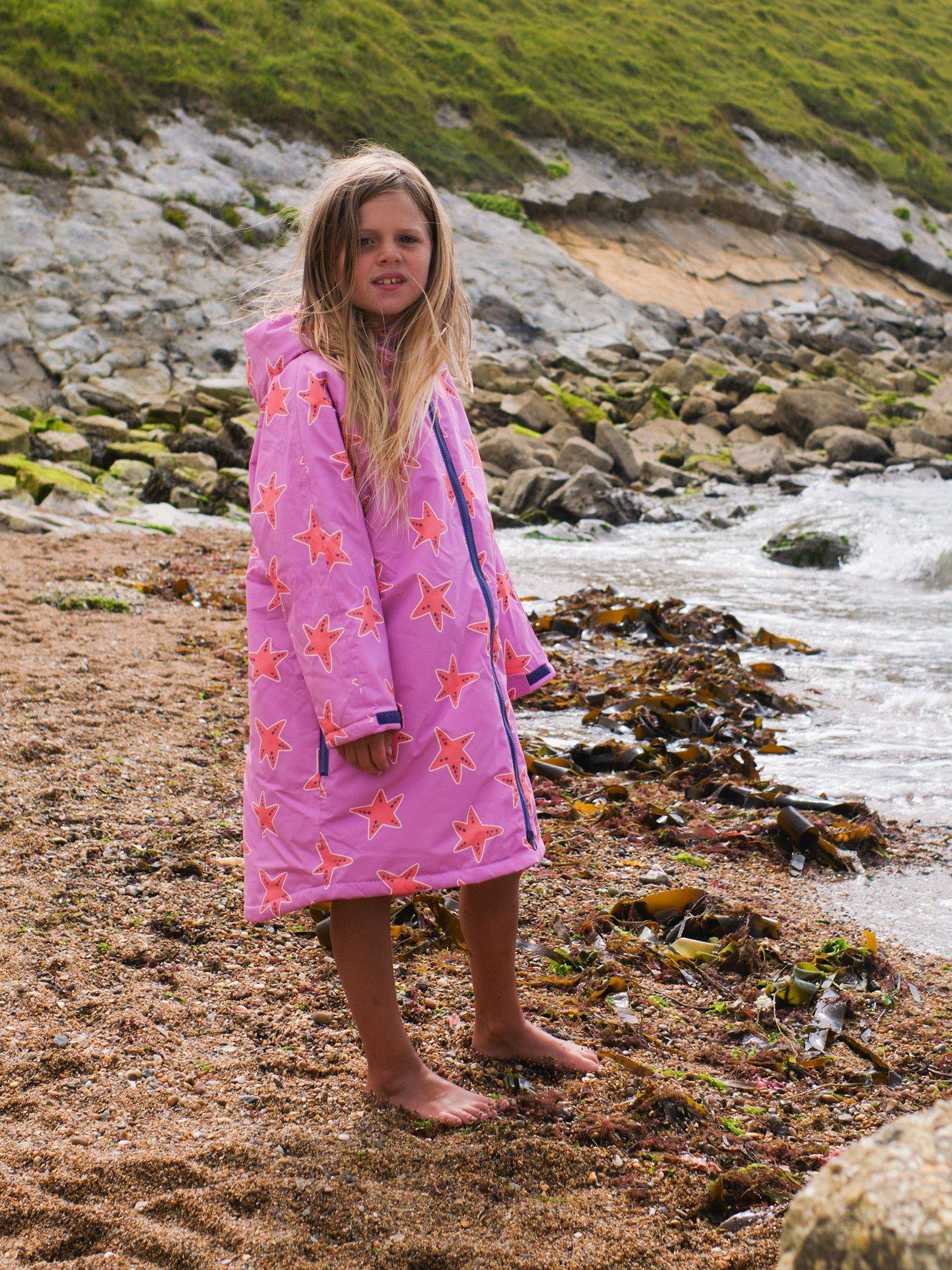 Product image 2 of 6, which shows Muddy Puddles Kids' Starfish Waterproof Robe, Pink/Multi, 2-3 years