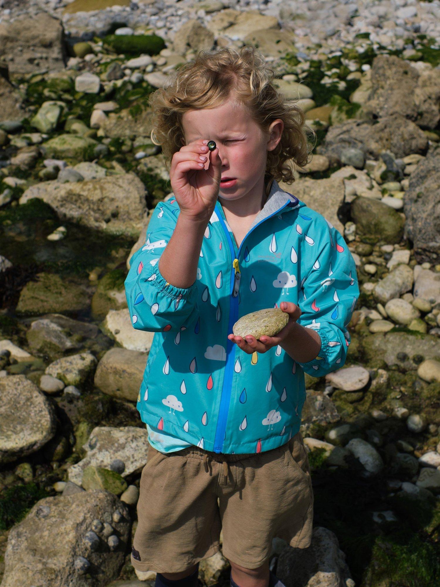Product image 3 of 5, which shows Muddy Puddles Kids' EcoLight Waterproof Lightweight Raindrops & Clouds Jacket, Turquoise/Multi, 12-18 months