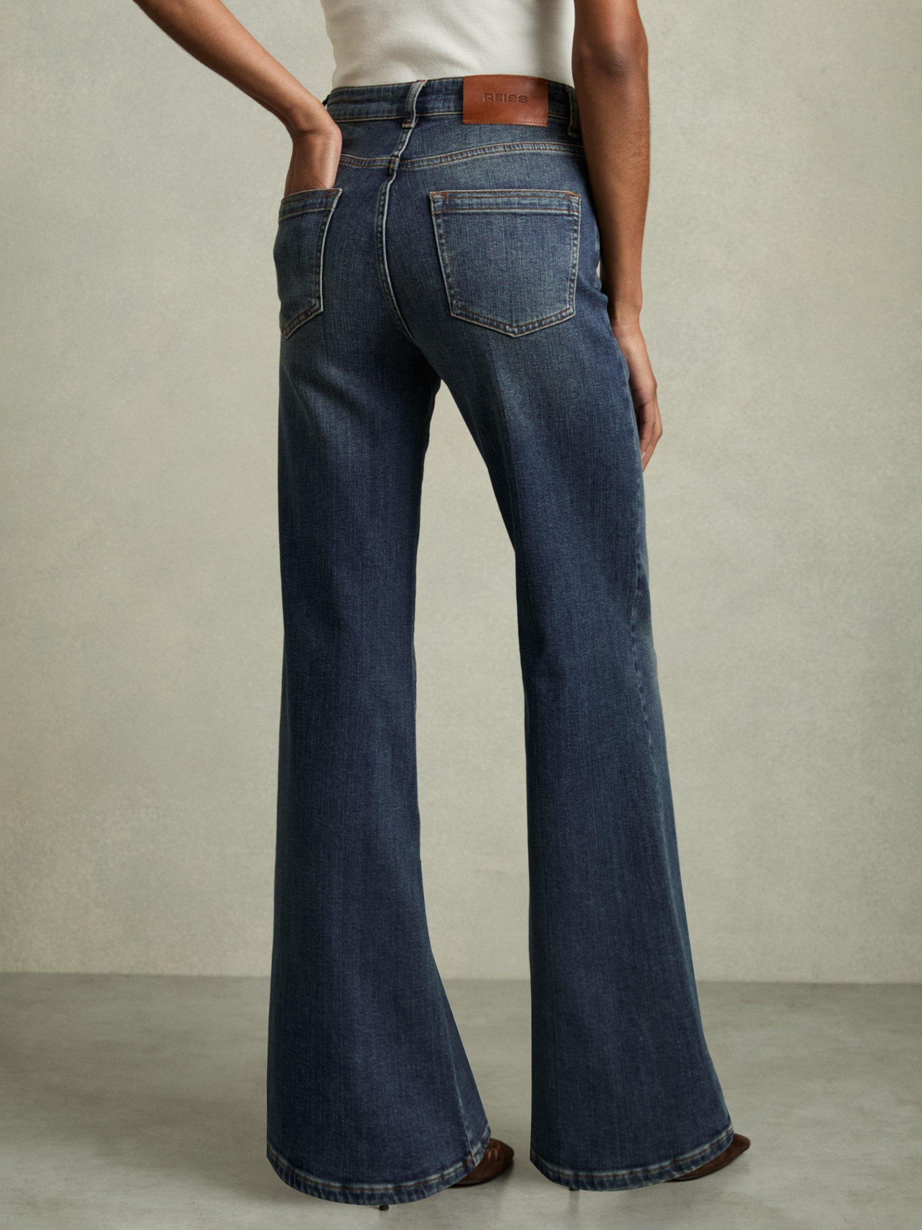 Product image 2 of 5, which shows Reiss Bonnie Mid Rise Flared Jeans, Mid Blue, 25R