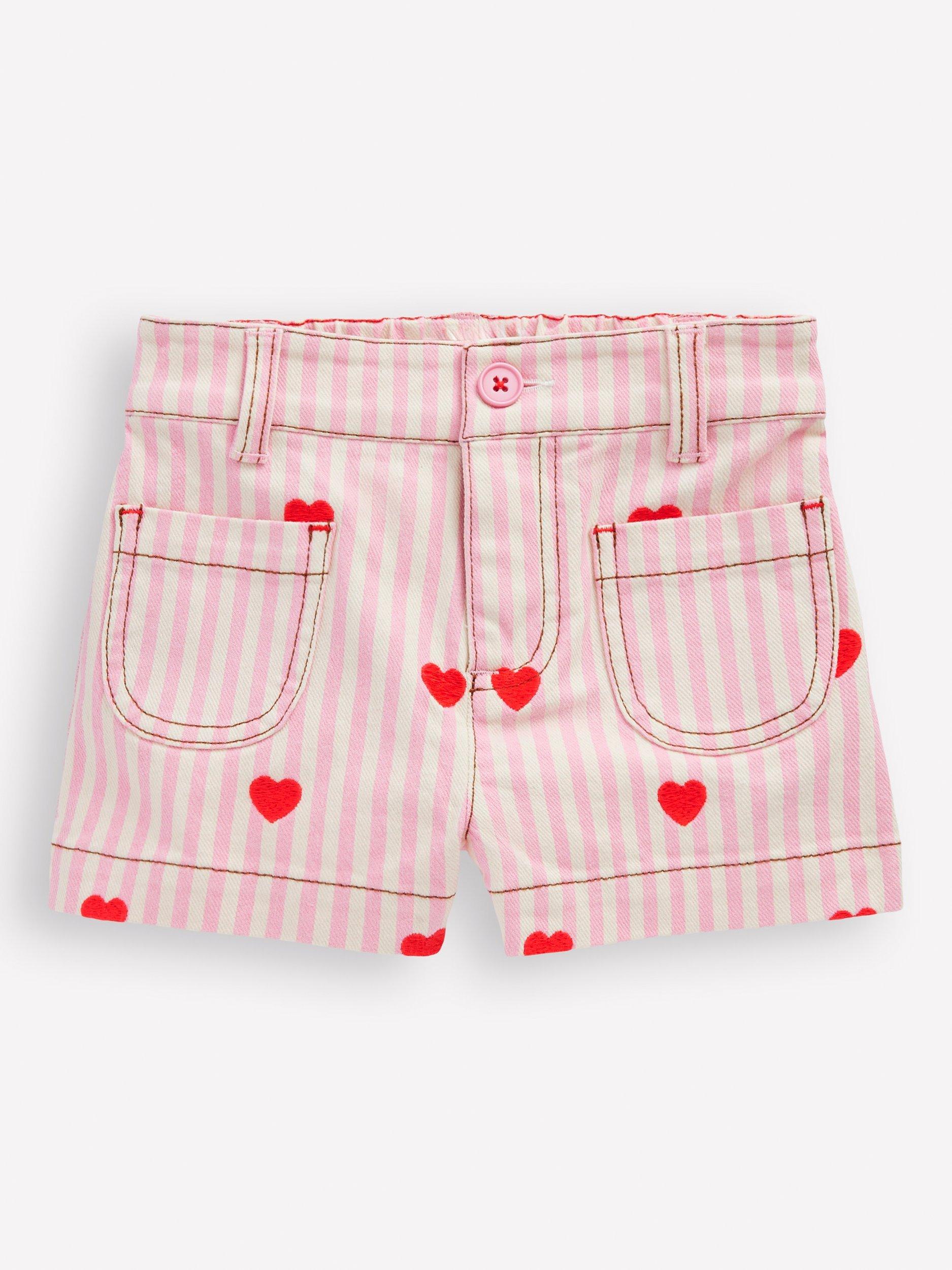 Product image 1 of 3, which shows Mini Boden Girl's Patch Pocket Shorts, Pink/Ivory Hearts, 2-3 years