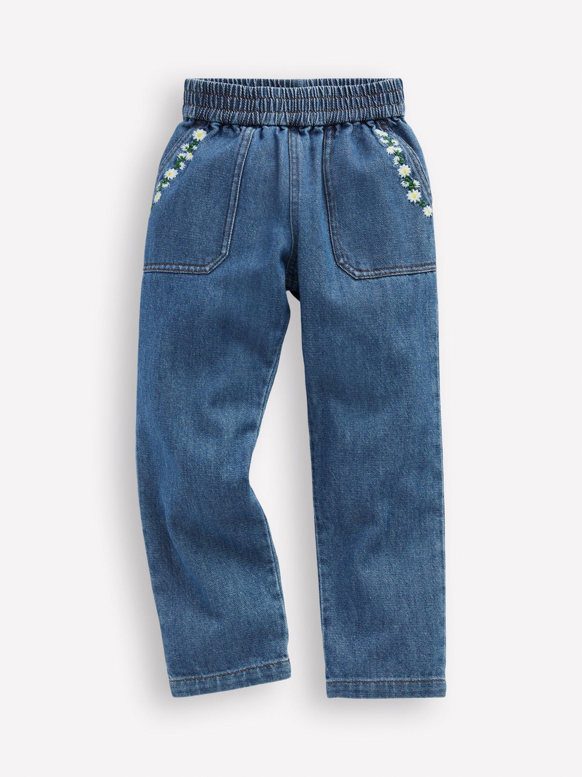 Product image 1 of 3, which shows Mini Boden Girl's Daisy Pocket Pull-On Denim Trousers, Embroidered Daisy, 2-3 years