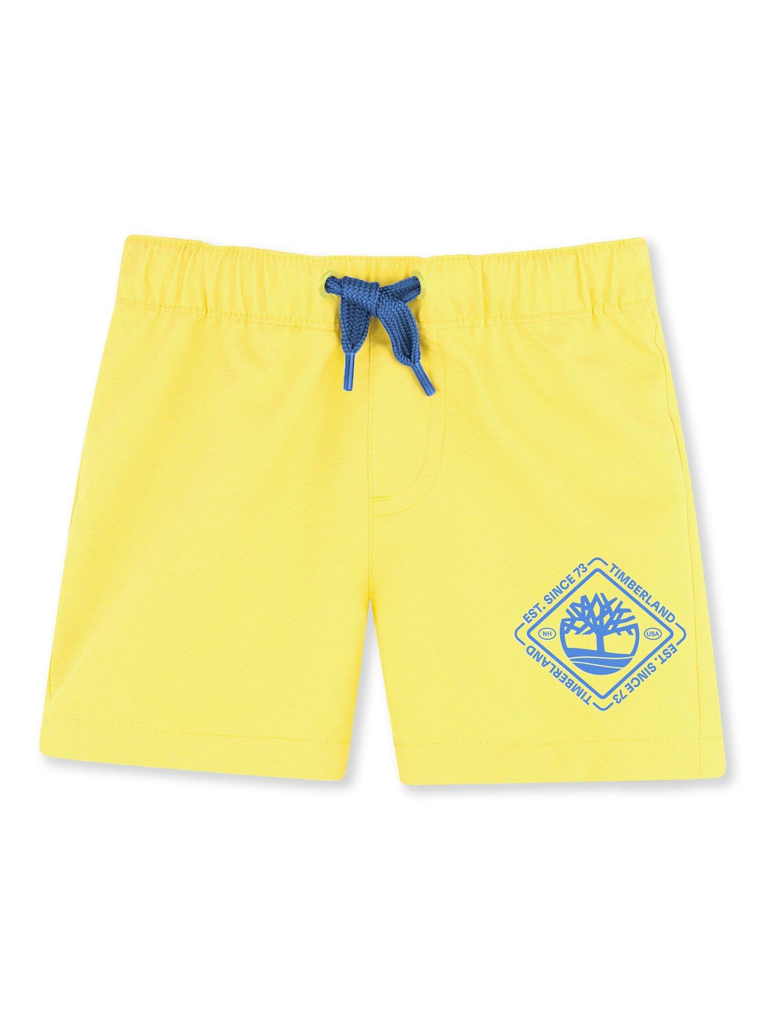 Product image 1 of 2, which shows Timberland Kids' Drawstring Swim Shorts, Straw Yellow, 6 months