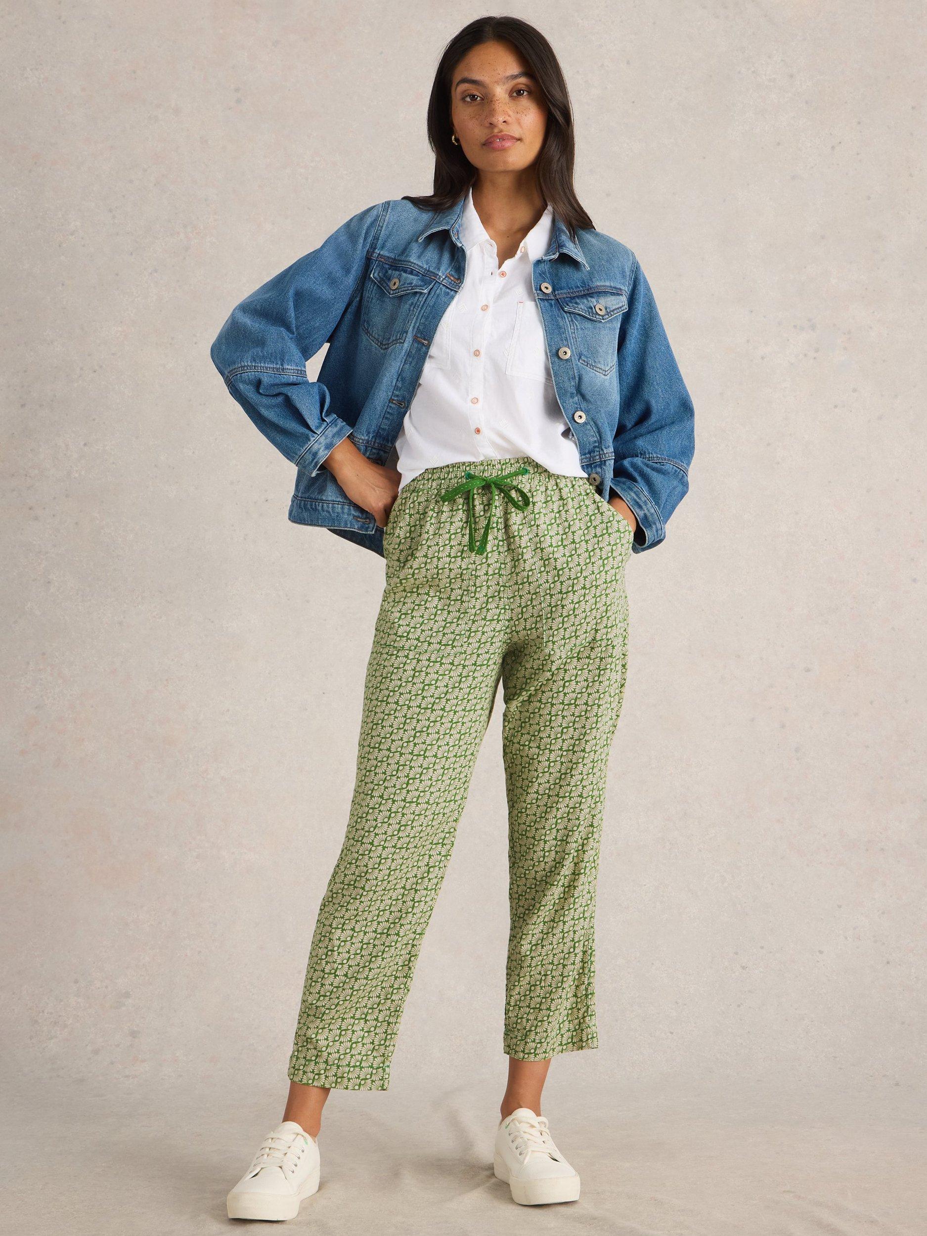 Product image 1 of 6, which shows White Stuff Elle Graphic Floral Linen Blend Trousers, Green/Cream, 10R