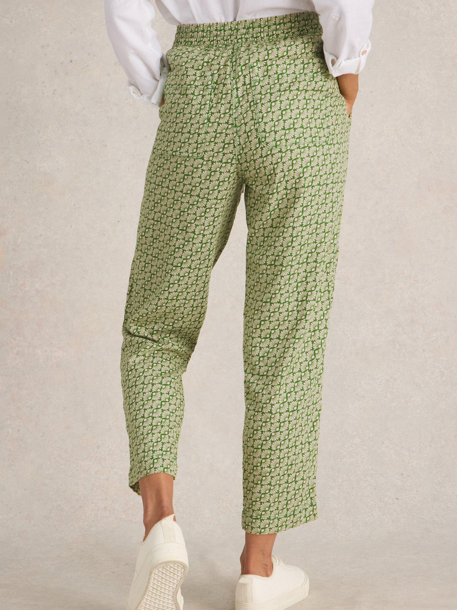 Product image 2 of 6, which shows White Stuff Elle Graphic Floral Linen Blend Trousers, Green/Cream, 10R