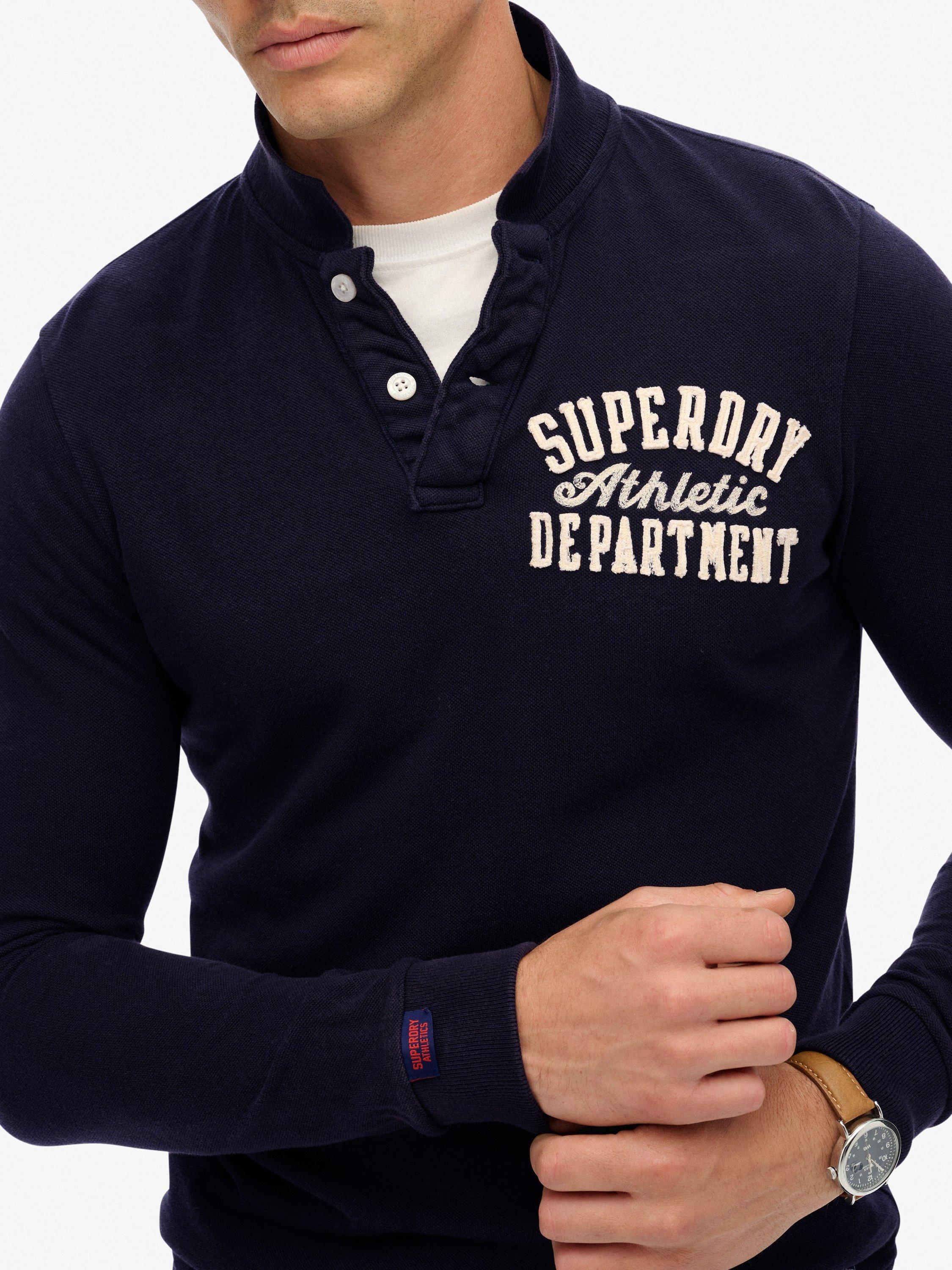Product image 4 of 7, which shows Superdry Vintage Athletic Long Sleeve Cotton Polo Shirt, Eclipse Navy, S