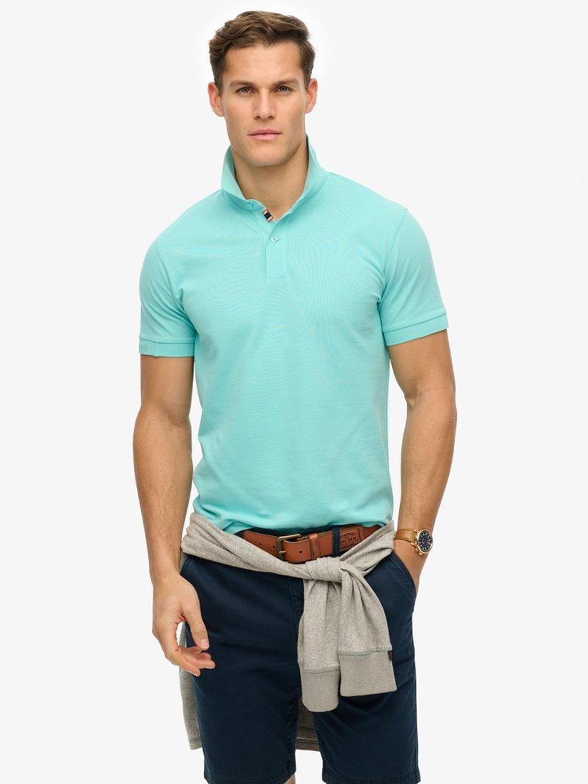 Product image 1 of 4, which shows Superdry Cotton City Pique Polo Shirt, Aqua Sky Turquoise, S