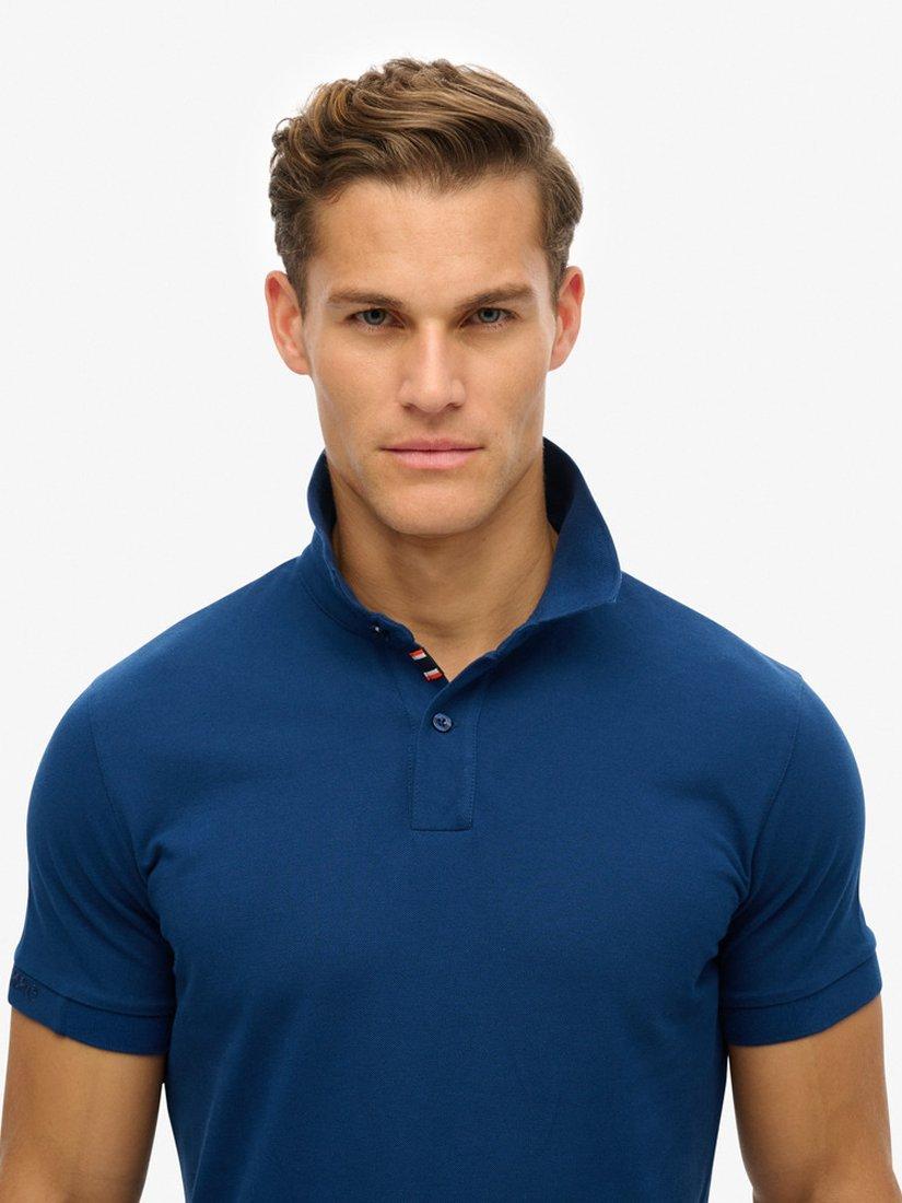 Product image 4 of 5, which shows Superdry Cotton City Pique Polo Shirt, Pilot Mid Blue, S