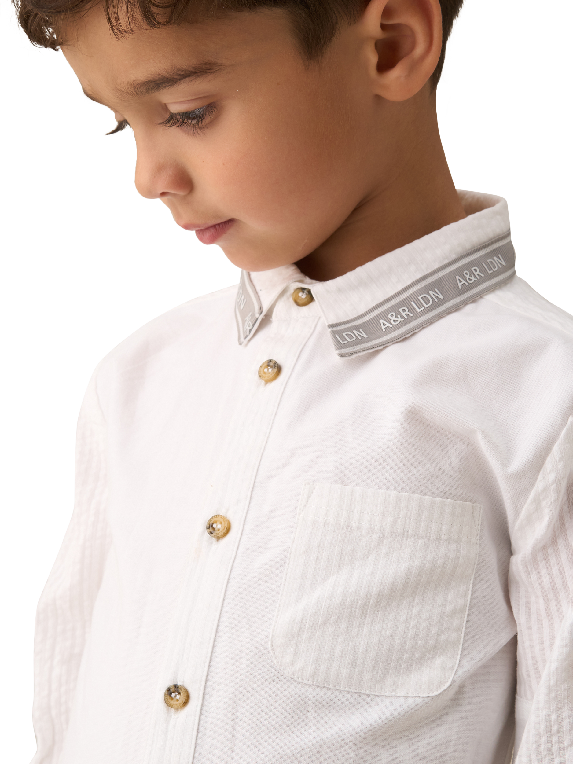 Product image 2 of 7, which shows Angel & Rocket Kids' Chase Cotton Textured Block Shirt, White/Multi, 3 years