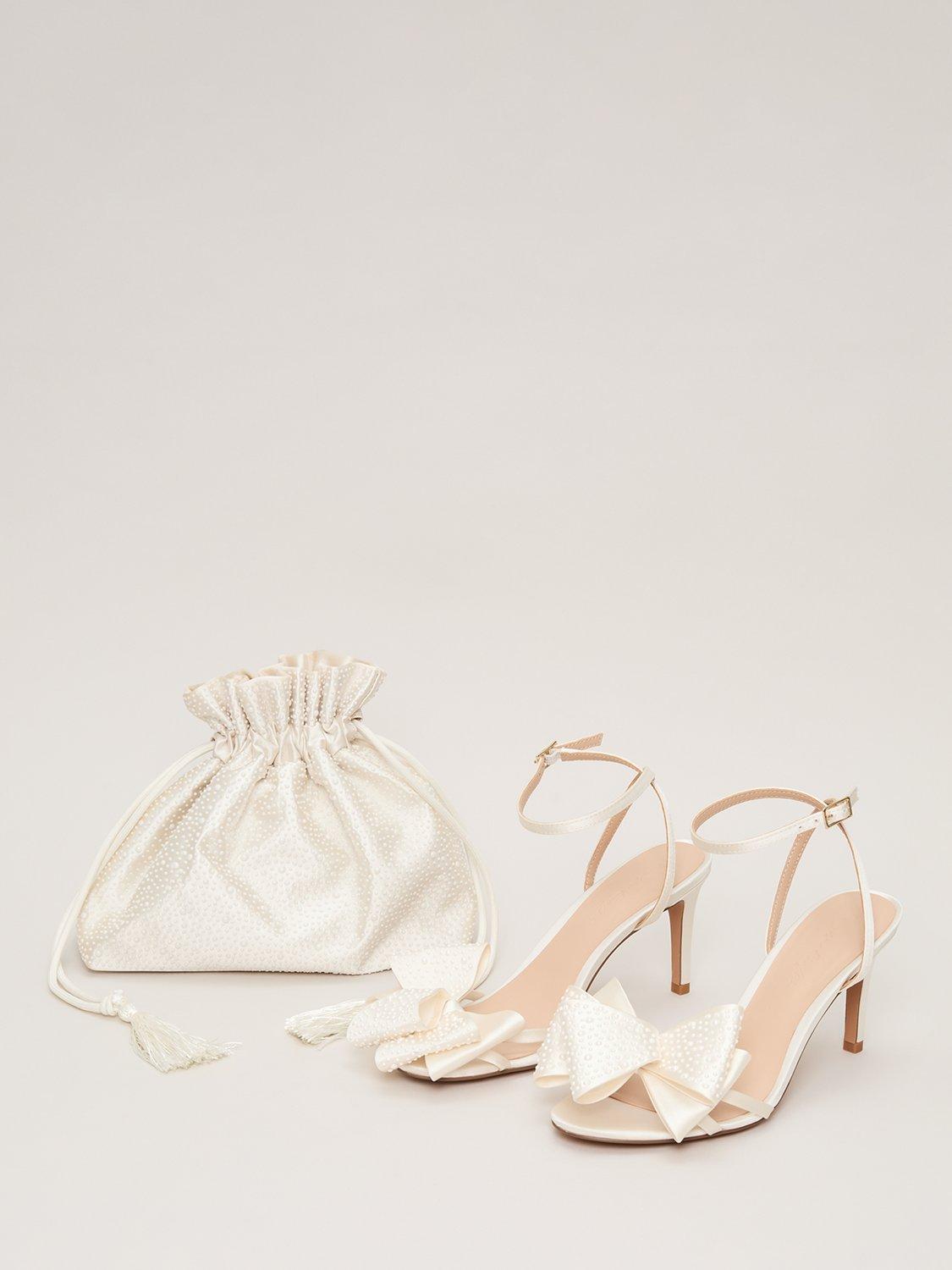 Product image 5 of 9, which shows Phase Eight Pearl Bow Bridal Sandals, Ivory, 3