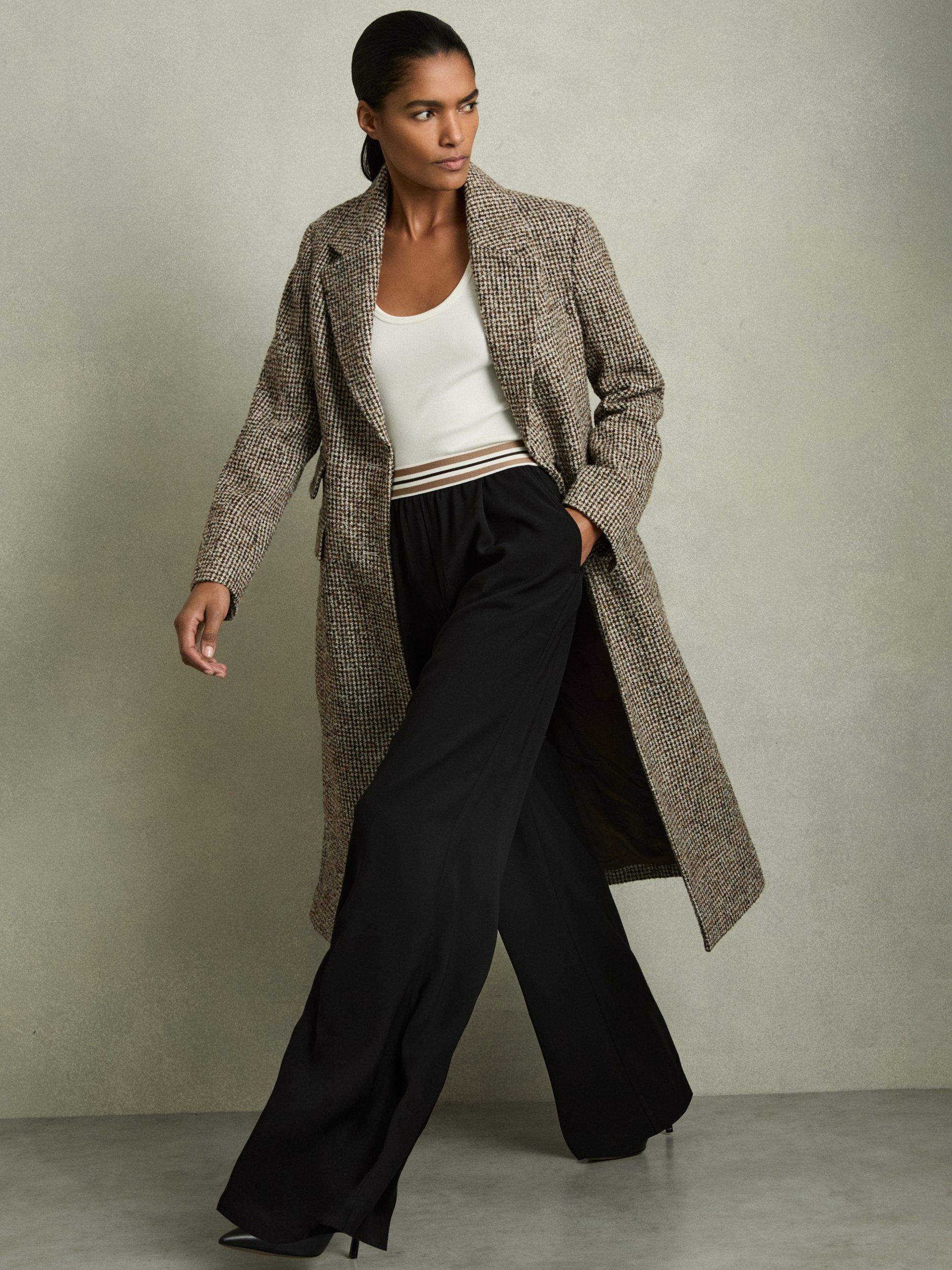 Product image 1 of 5, which shows Reiss Abs Stripe Waistband Wide Leg Trousers, Black, 6R