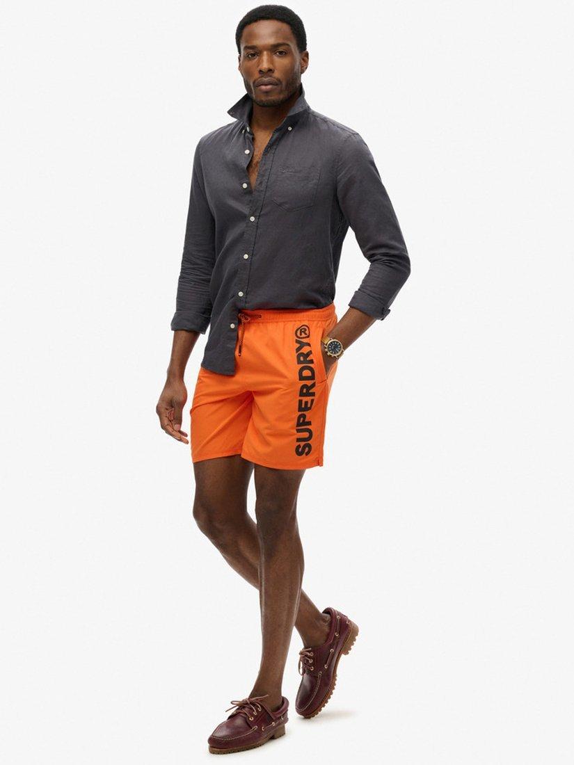 Product image 3 of 7, which shows Superdry Sport Graphic 17" Swim Shorts, Denver Orange, S