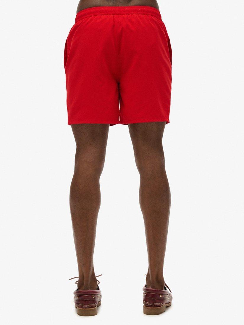 Product image 5 of 7, which shows Superdry Essential 17" Swim Shorts, Rouge Red, S