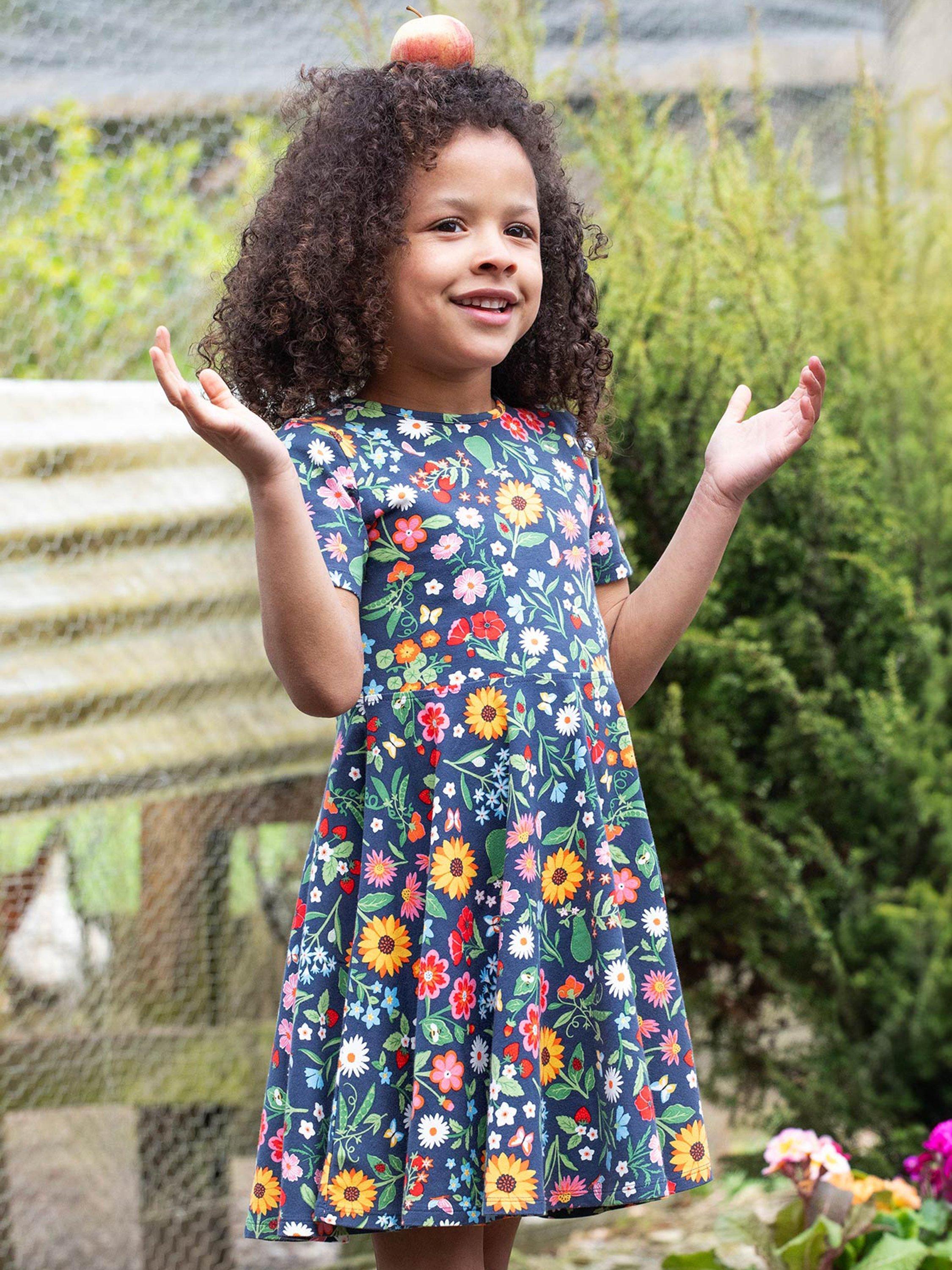 Product image 2 of 6, which shows Frugi Kids' Sunshine Organic Cotton Floral Skater Dress, Navy, 2-3 years
