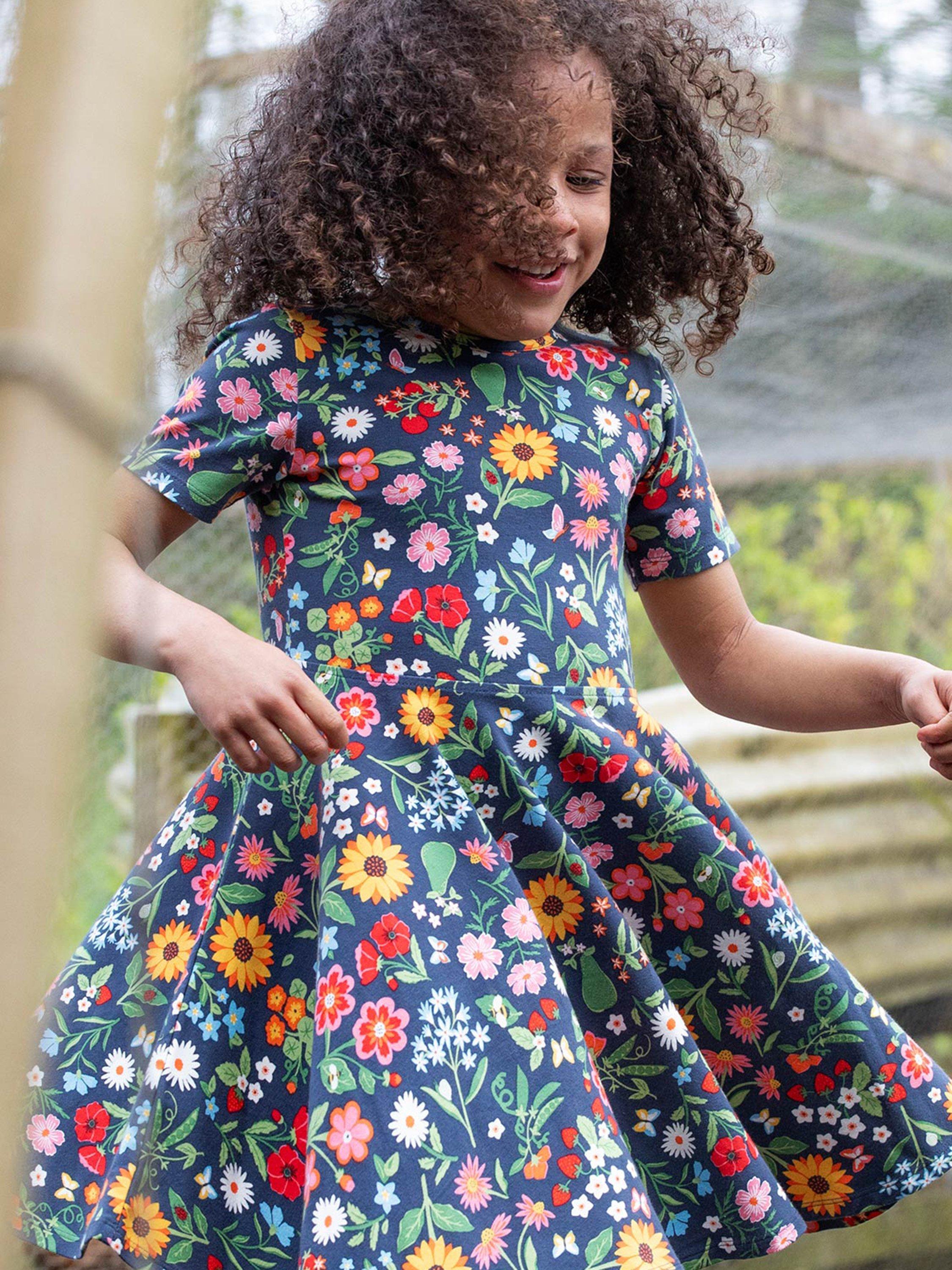 Product image 3 of 6, which shows Frugi Kids' Sunshine Organic Cotton Floral Skater Dress, Navy, 2-3 years