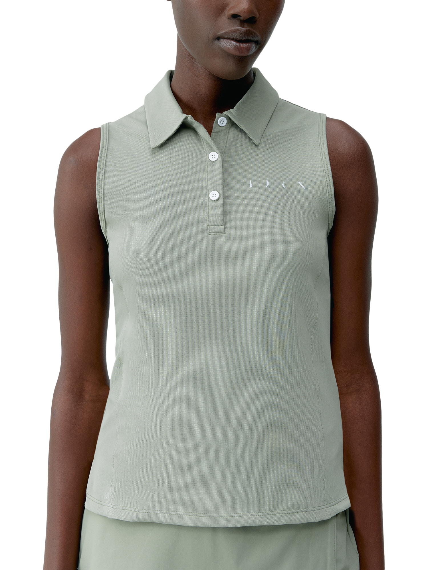 Product image 1 of 6, which shows Born Living Yoga Sleeveless Polo Shirt, Green, XS