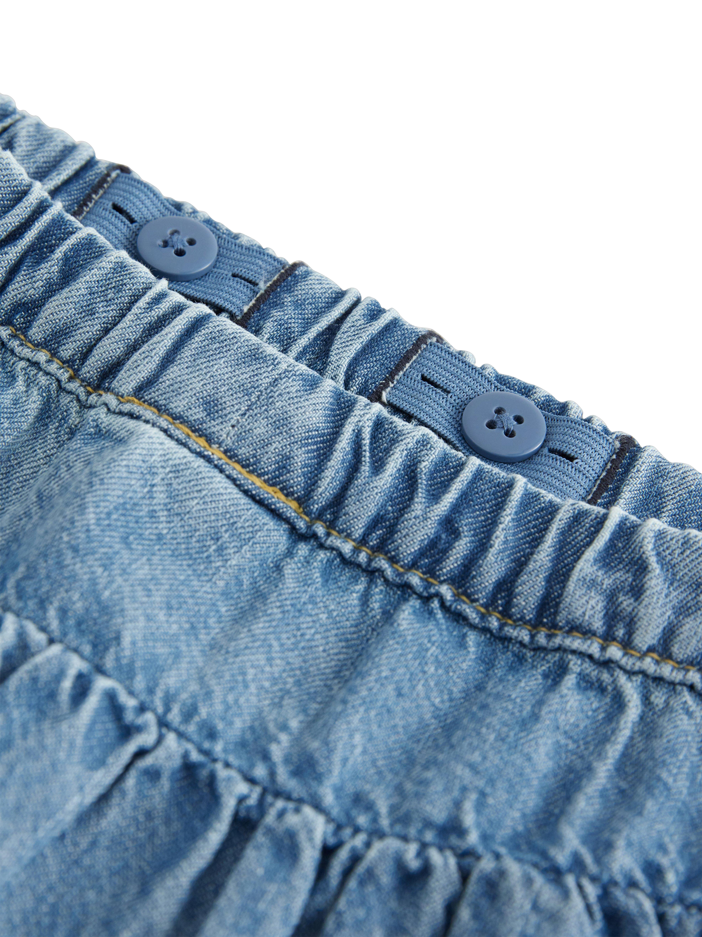 Product image 3 of 3, which shows Lindex Kids' V-Cut Flouncy Tier Skirt, Denim, 6-7 years